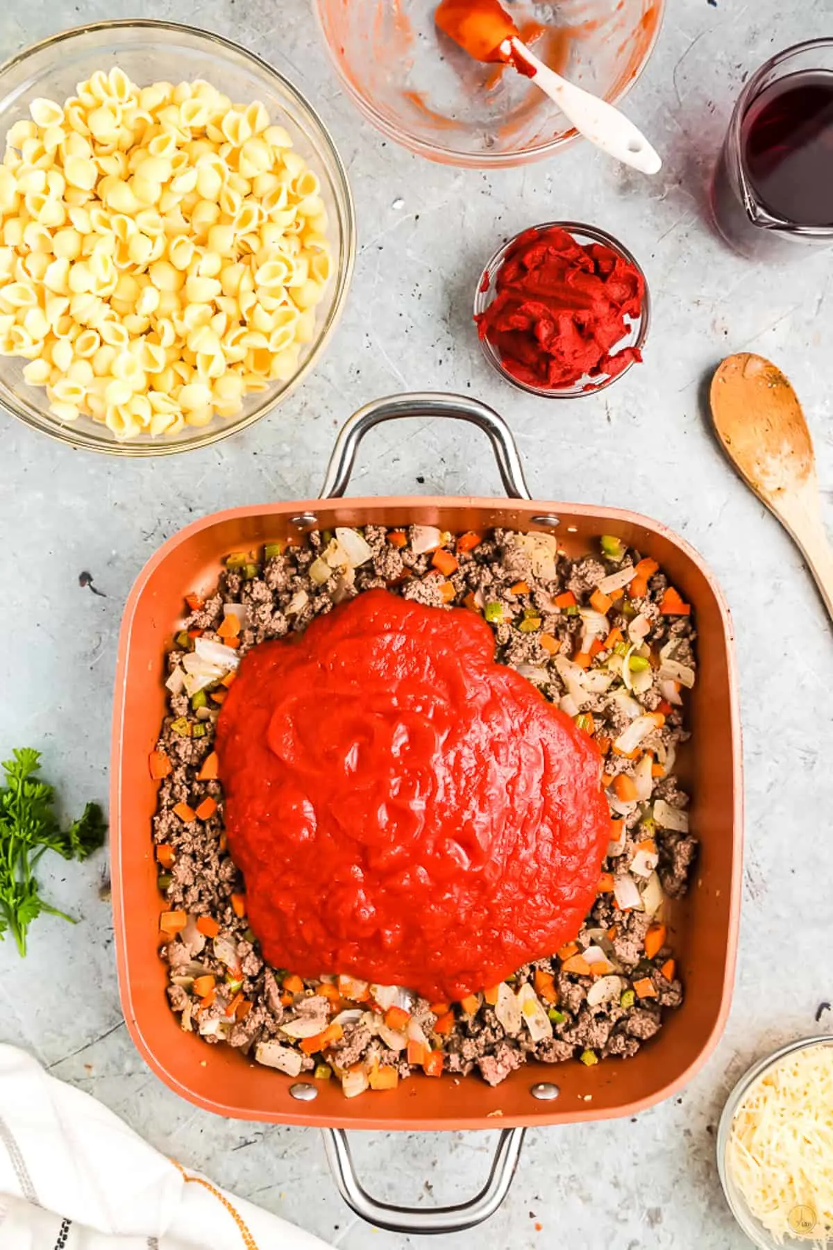 tomatoes on top of cooked meat