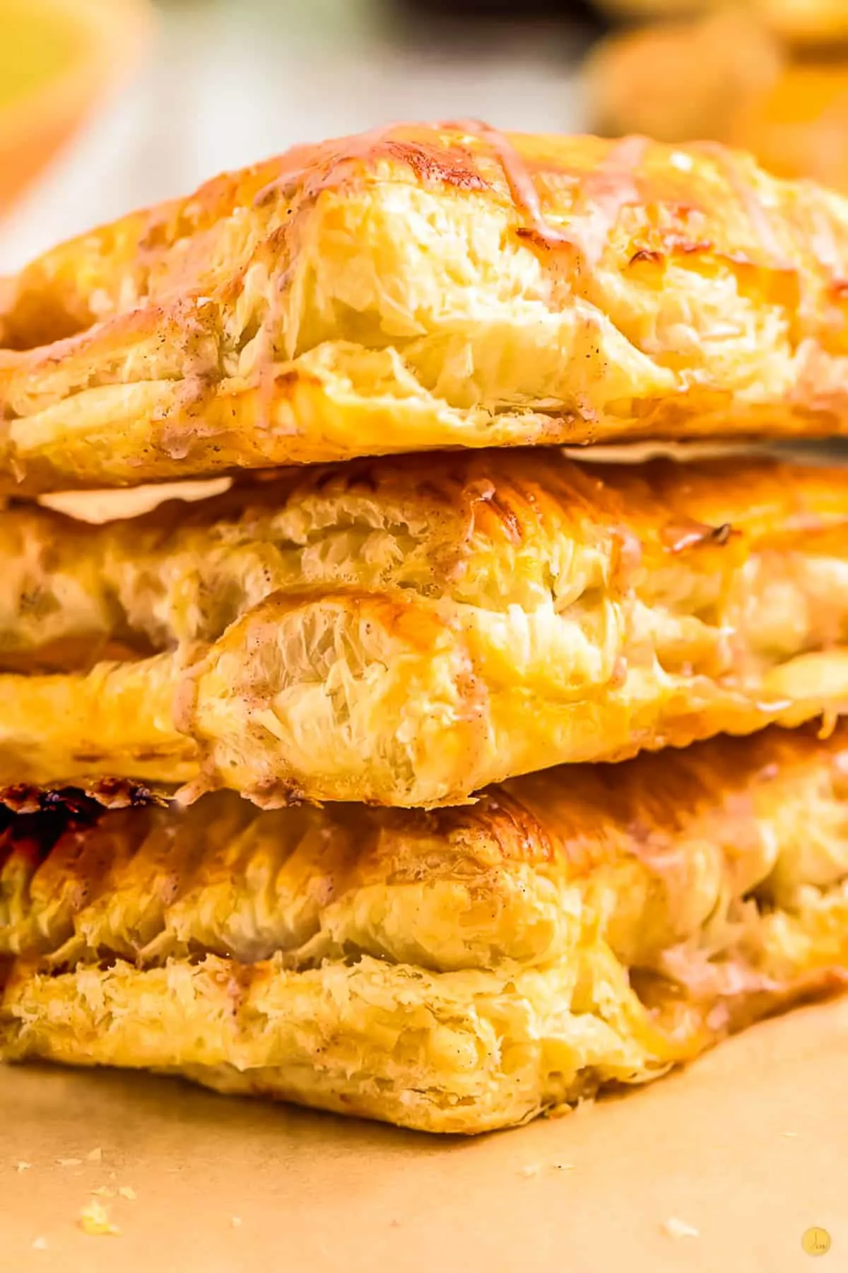stack of three apple pastries