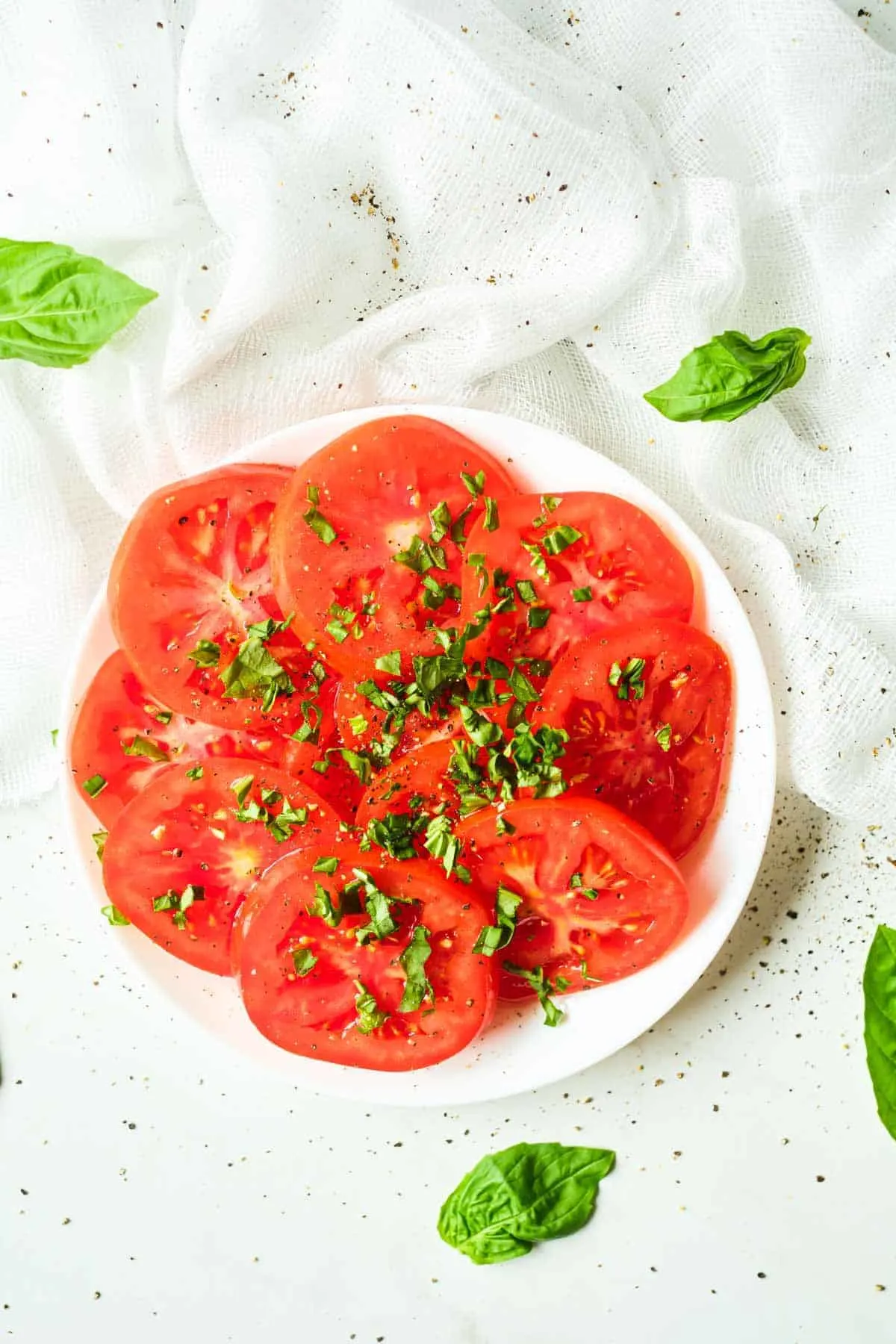 plate of marinated tomatoes