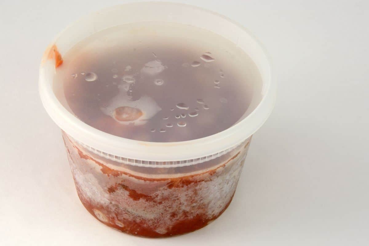 container of frozen tomato sauce