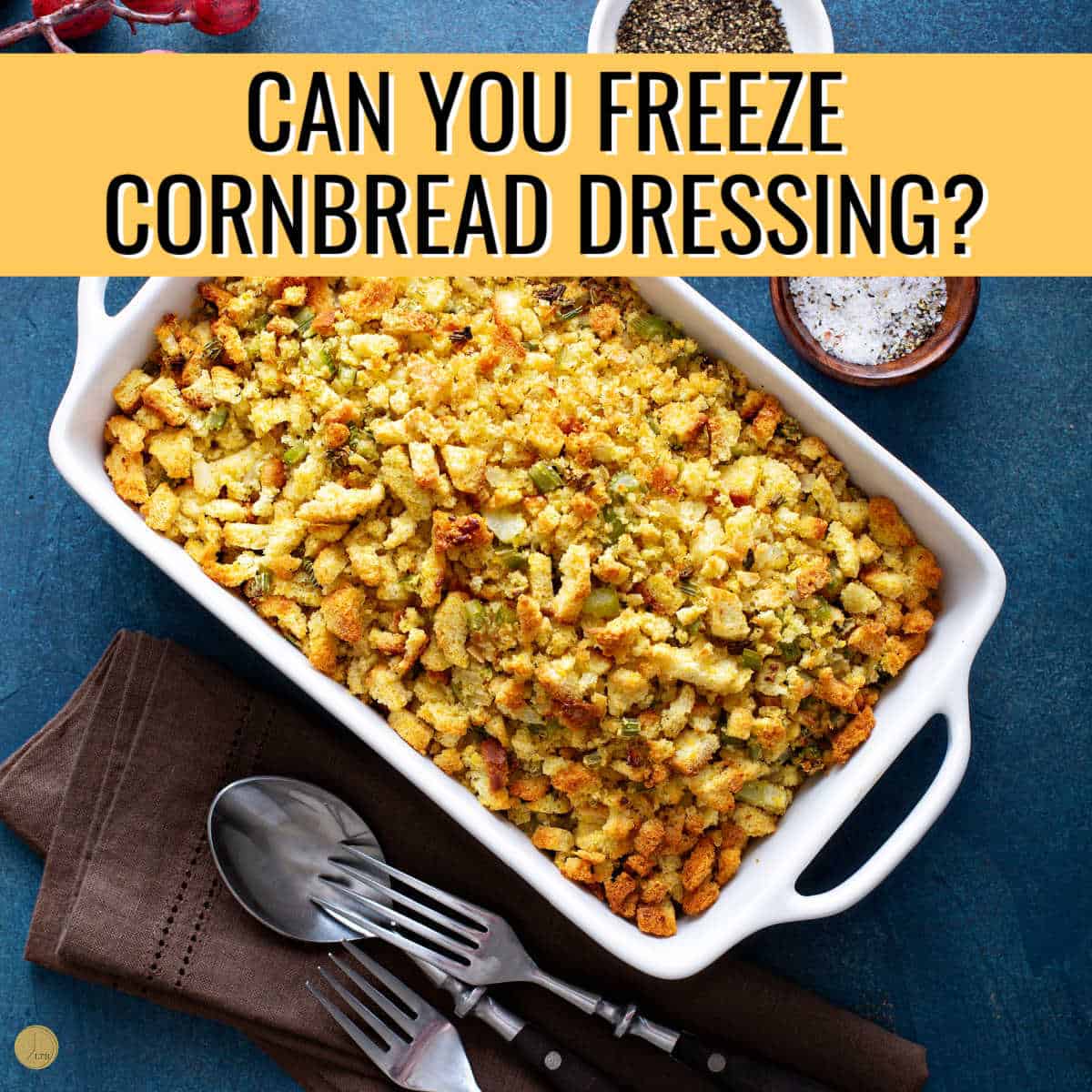 cornbread dressing in white dish with text in yellow banner