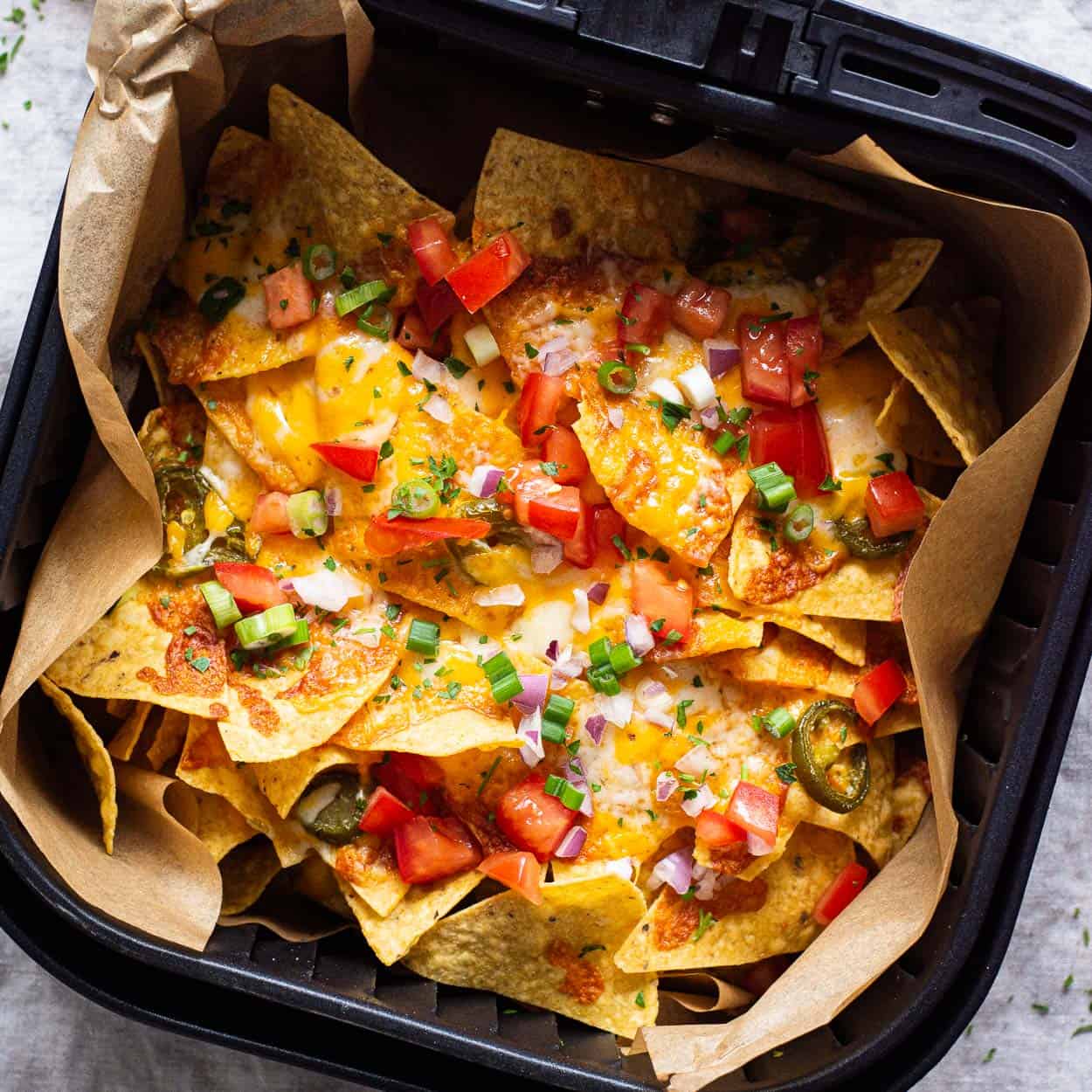 air fryer nachos in a basket