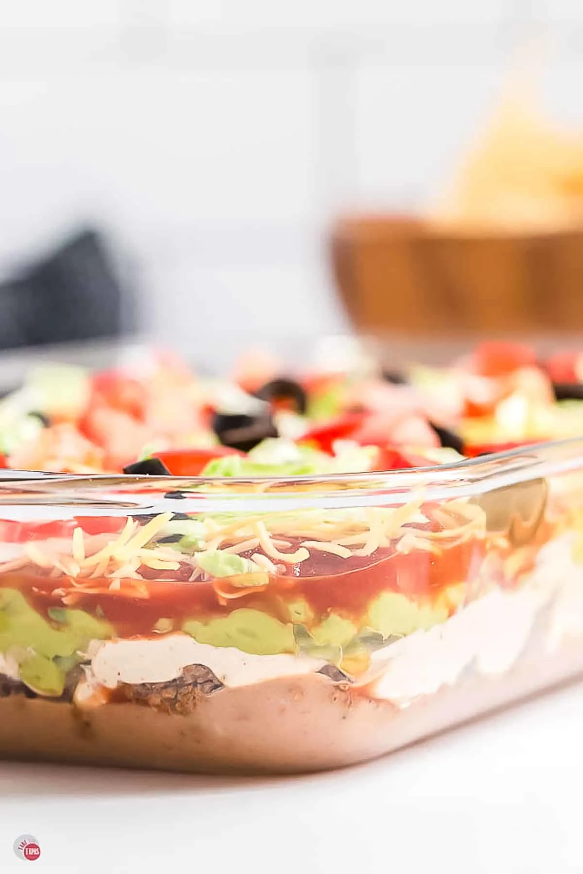 clear dish of 7 layer taco dip