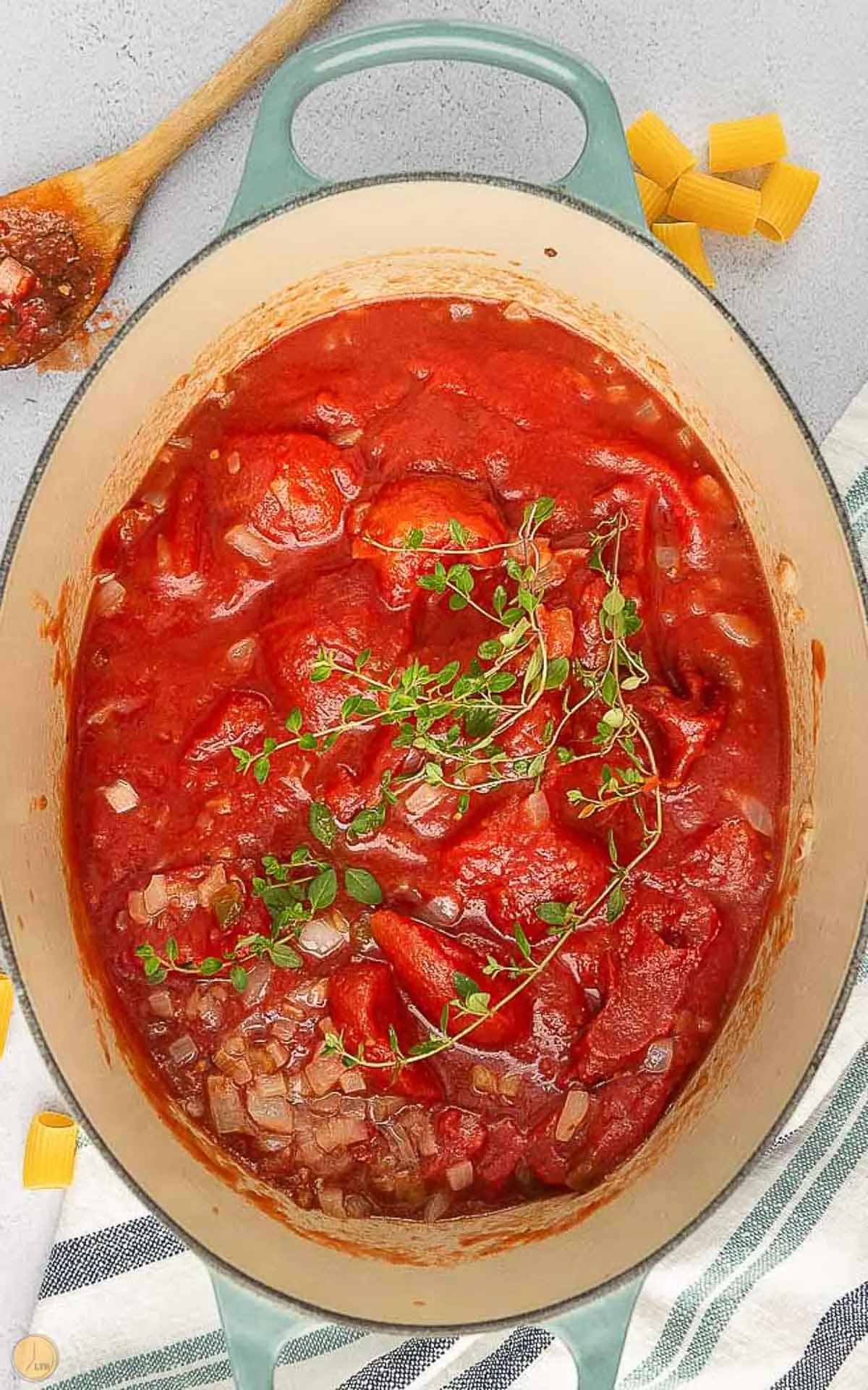 rigatoni sauce simmering in a pot