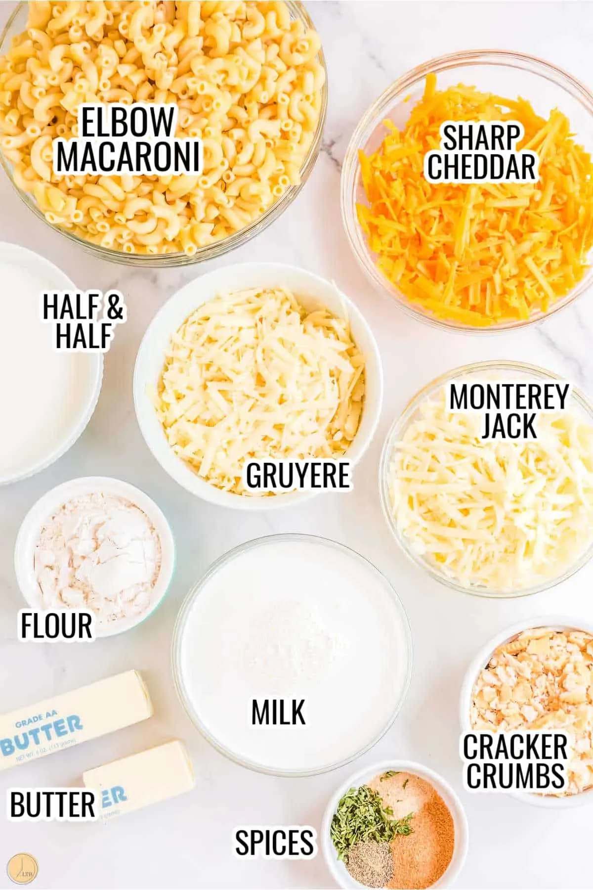 labeled picture of mac and cheese ingredients in clear bowls