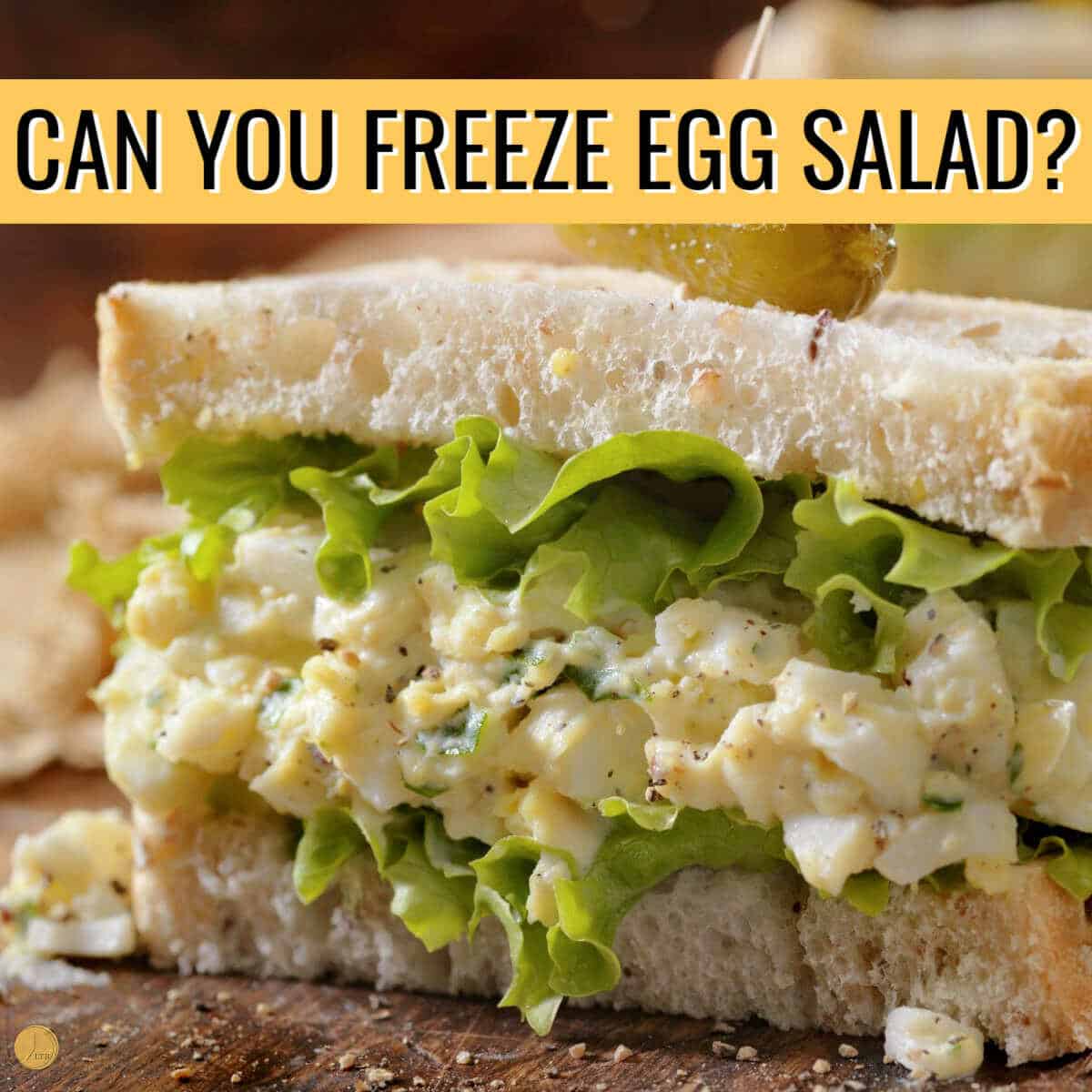 leftover egg salad sandwich half with yellow banner and text