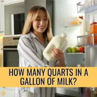 woman holding a quart of milk in front of the fridge