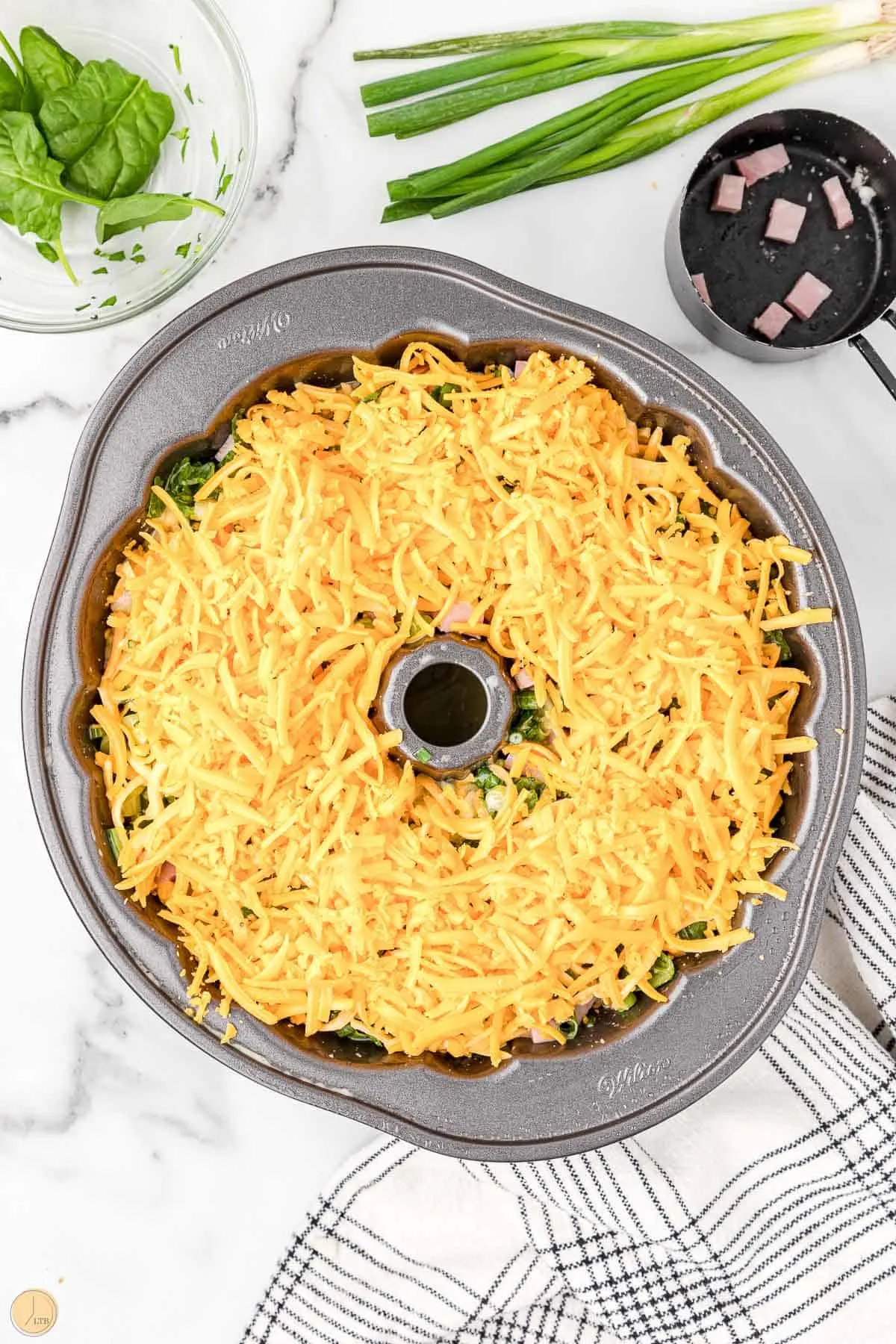 shredded cheese in a bundt pan
