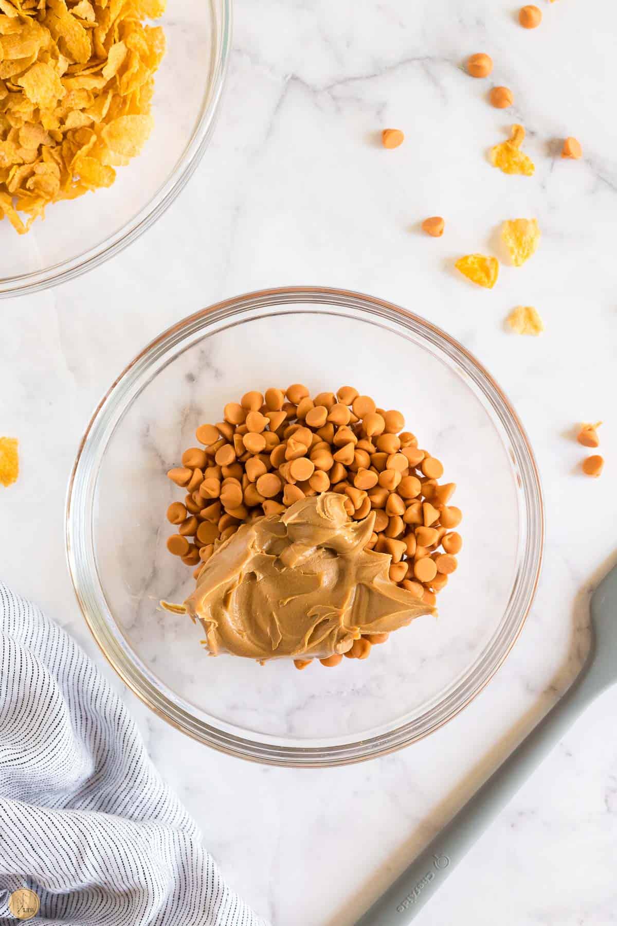 butterscotch chips and peanut butter in a clear bowl