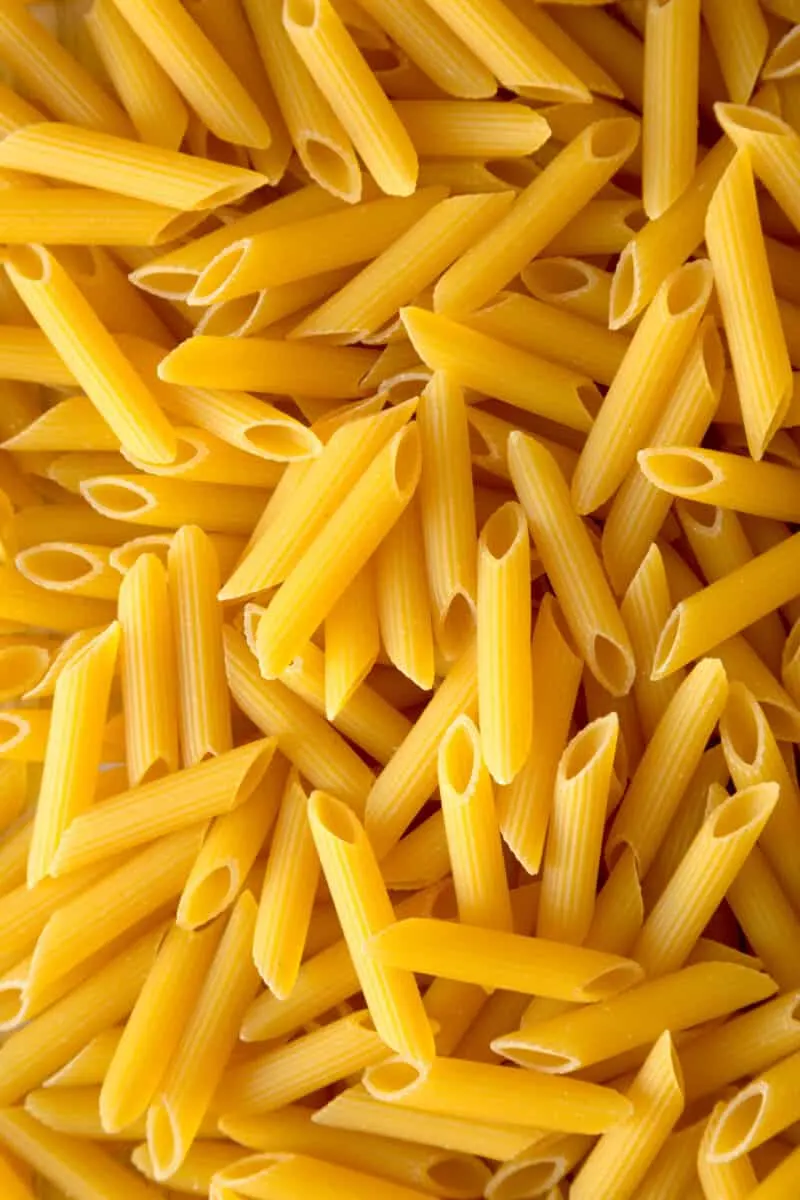 picture of dry piece of pasta like penne shapes