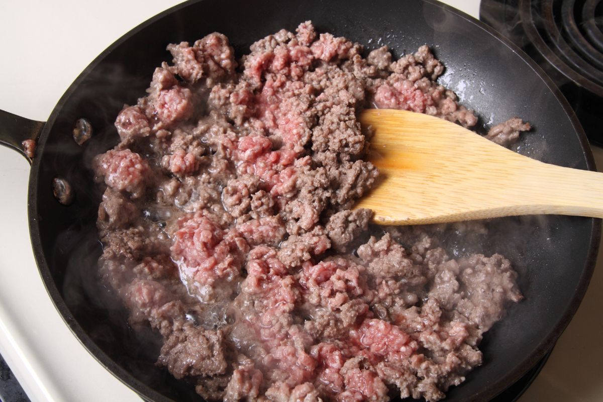 pan on stove while cooking hamburger meat