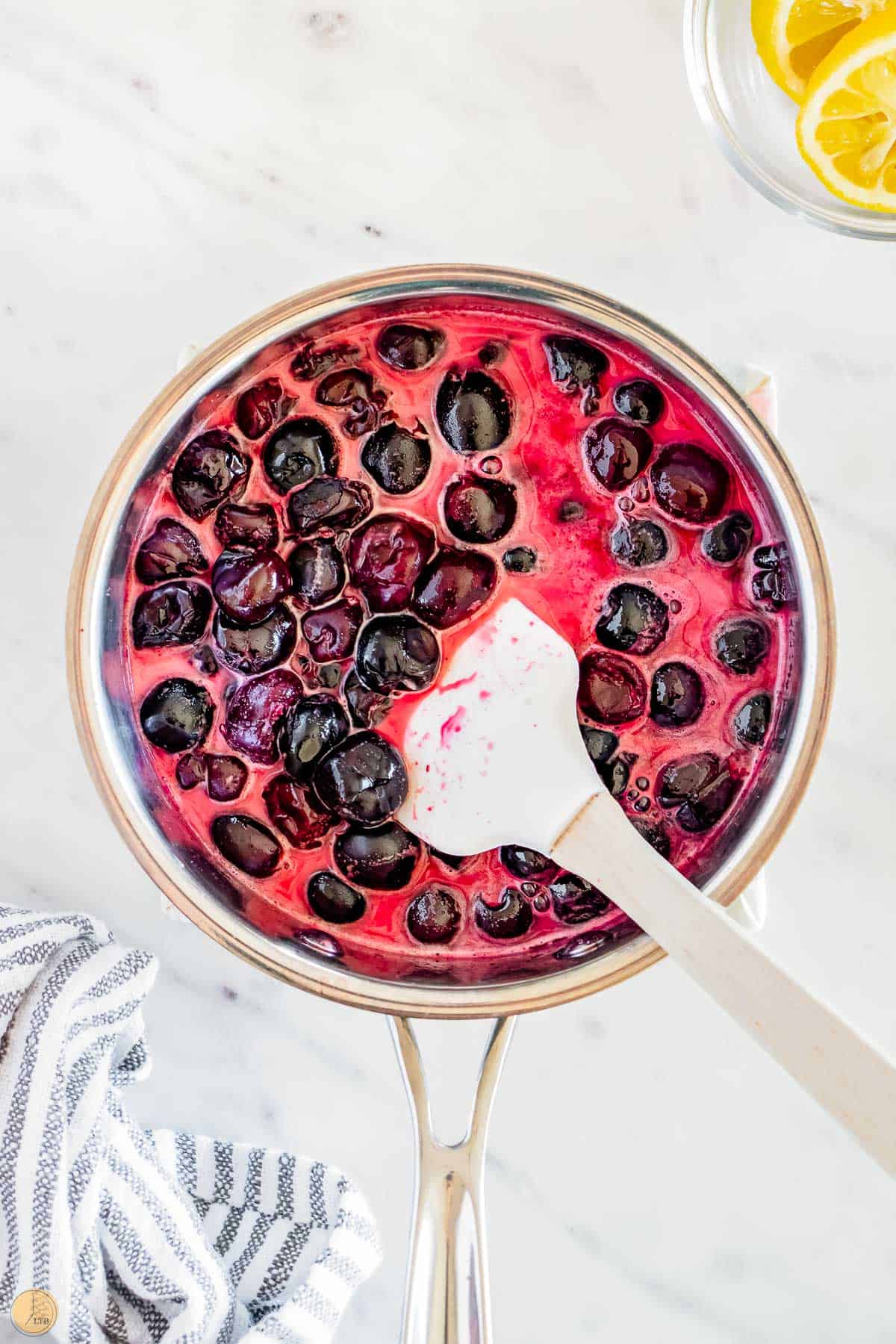 cherries boiling in a pot