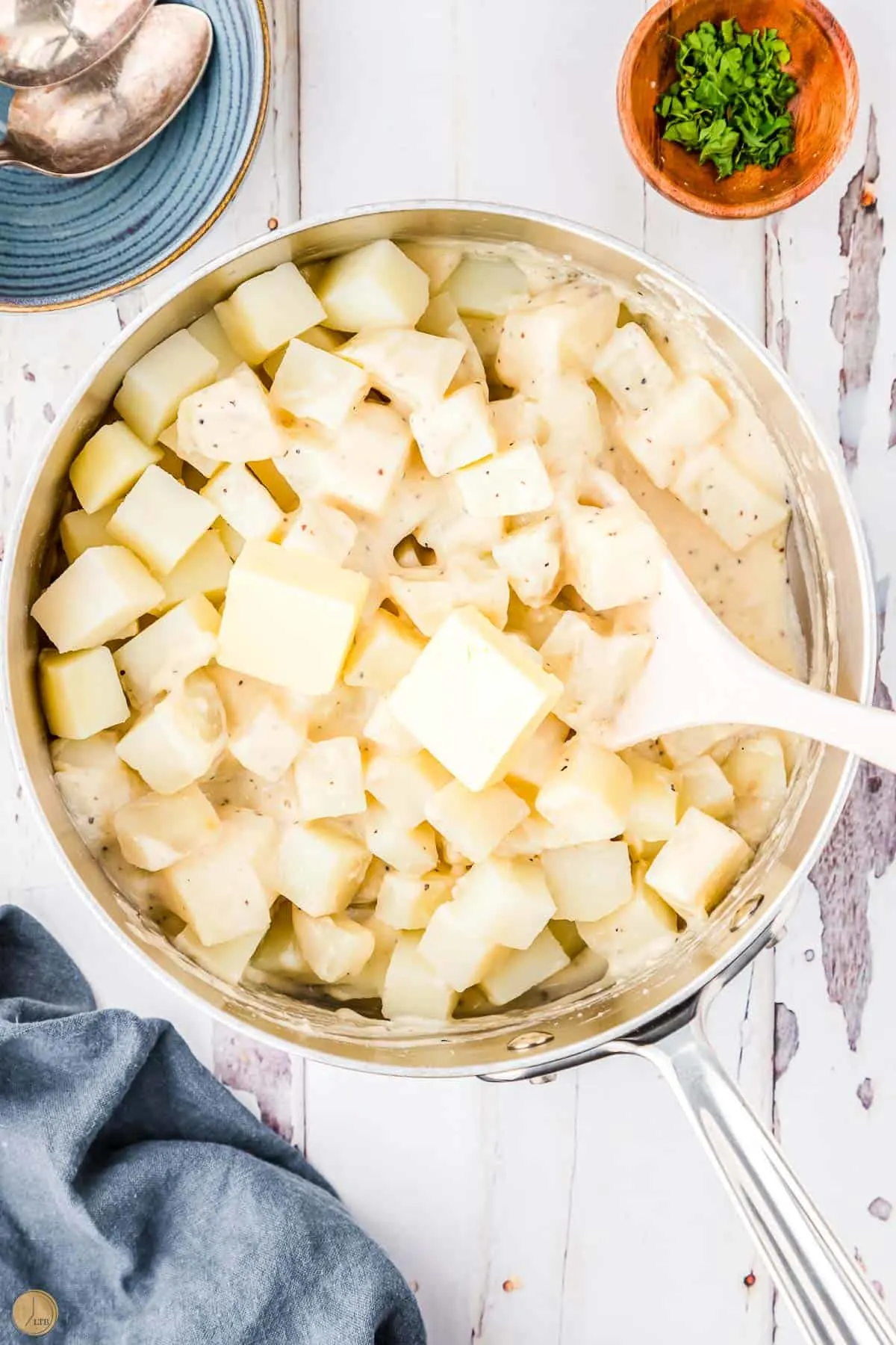 butter and potatoes in a pot