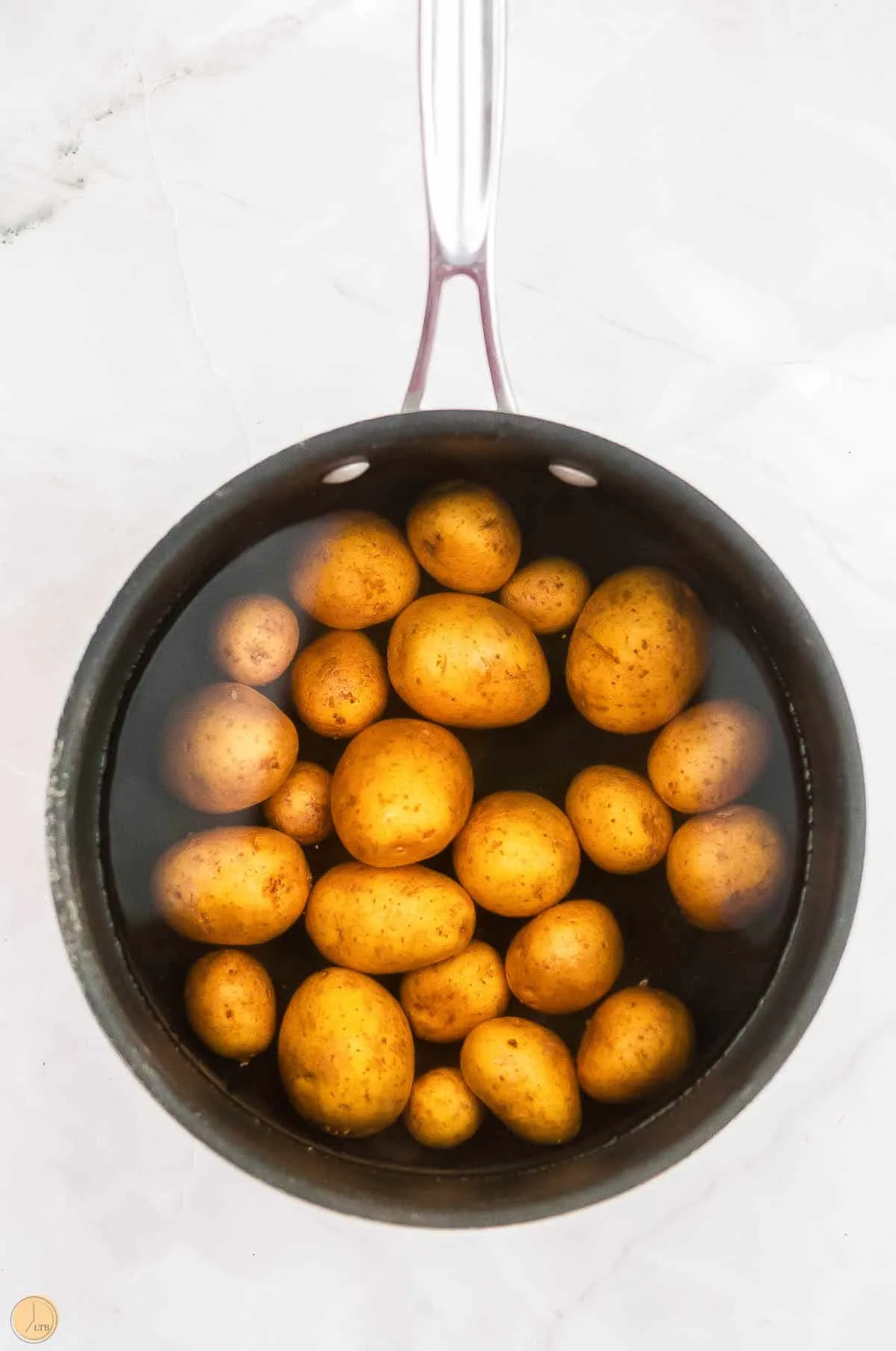 mini potatoes in cold water