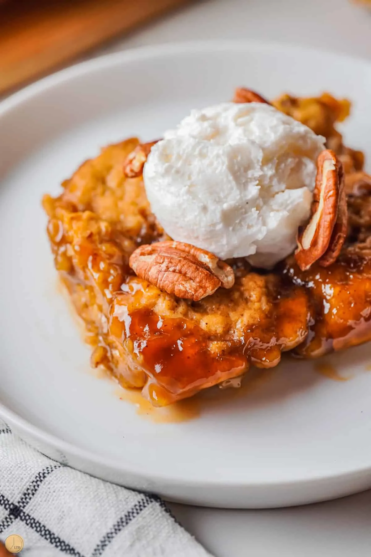 amish sugar dumplings on a plate with ice cream