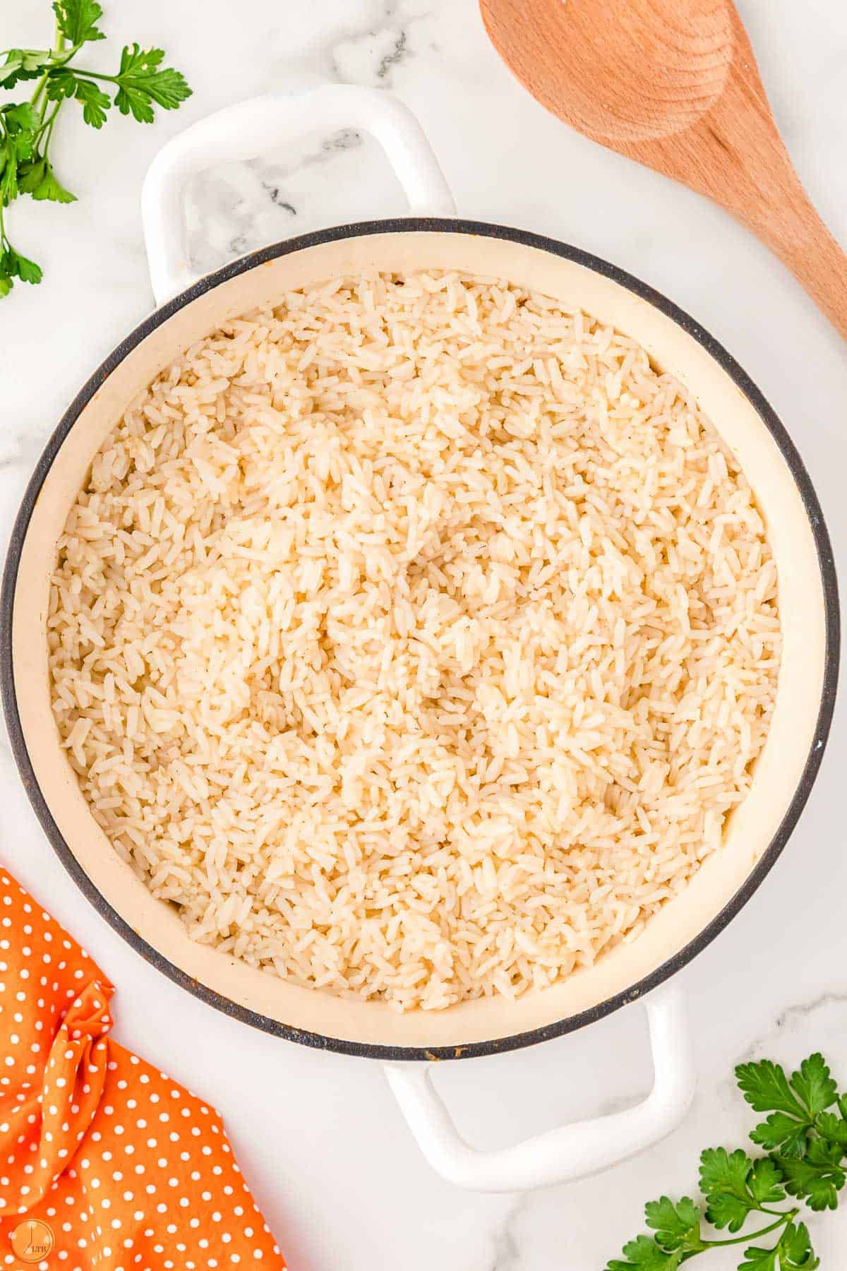 baked rice in a white pot