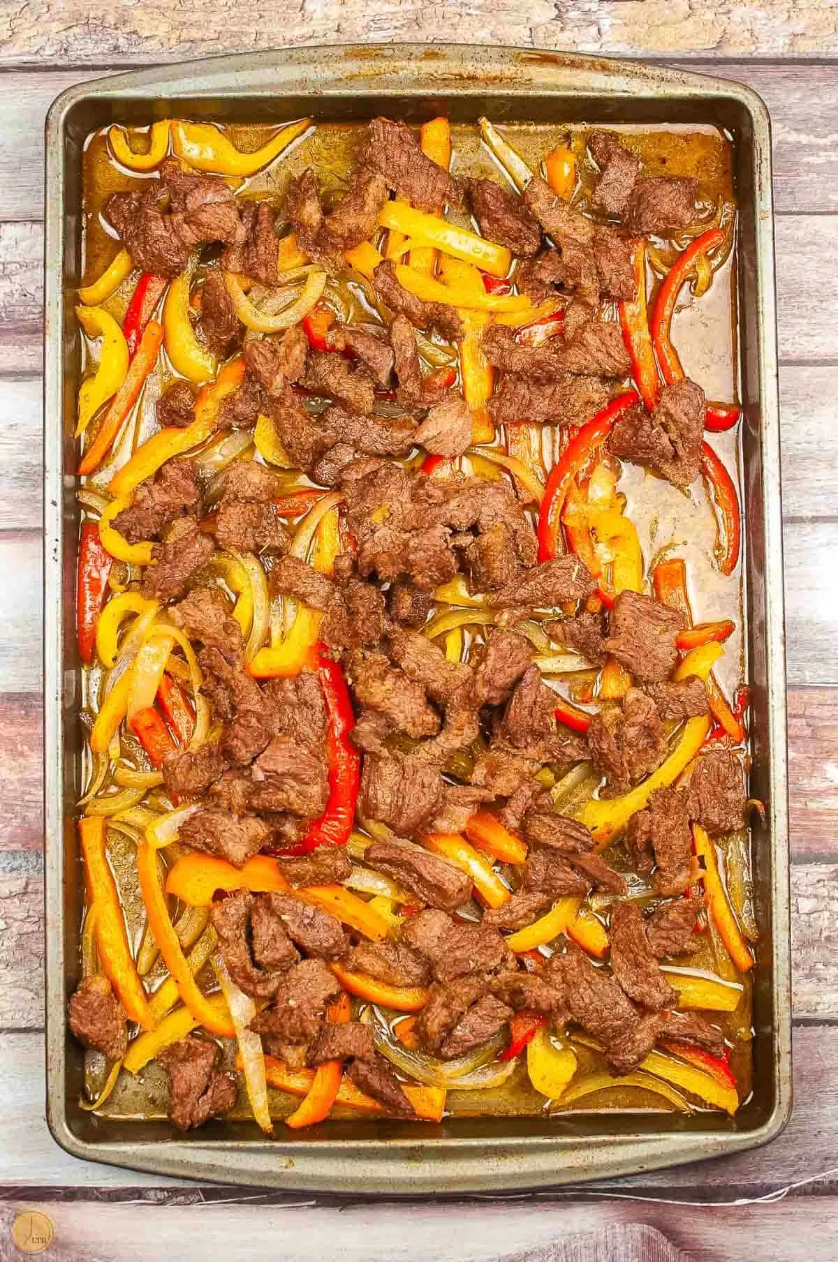 tex-mex food on a rimmed baking sheet