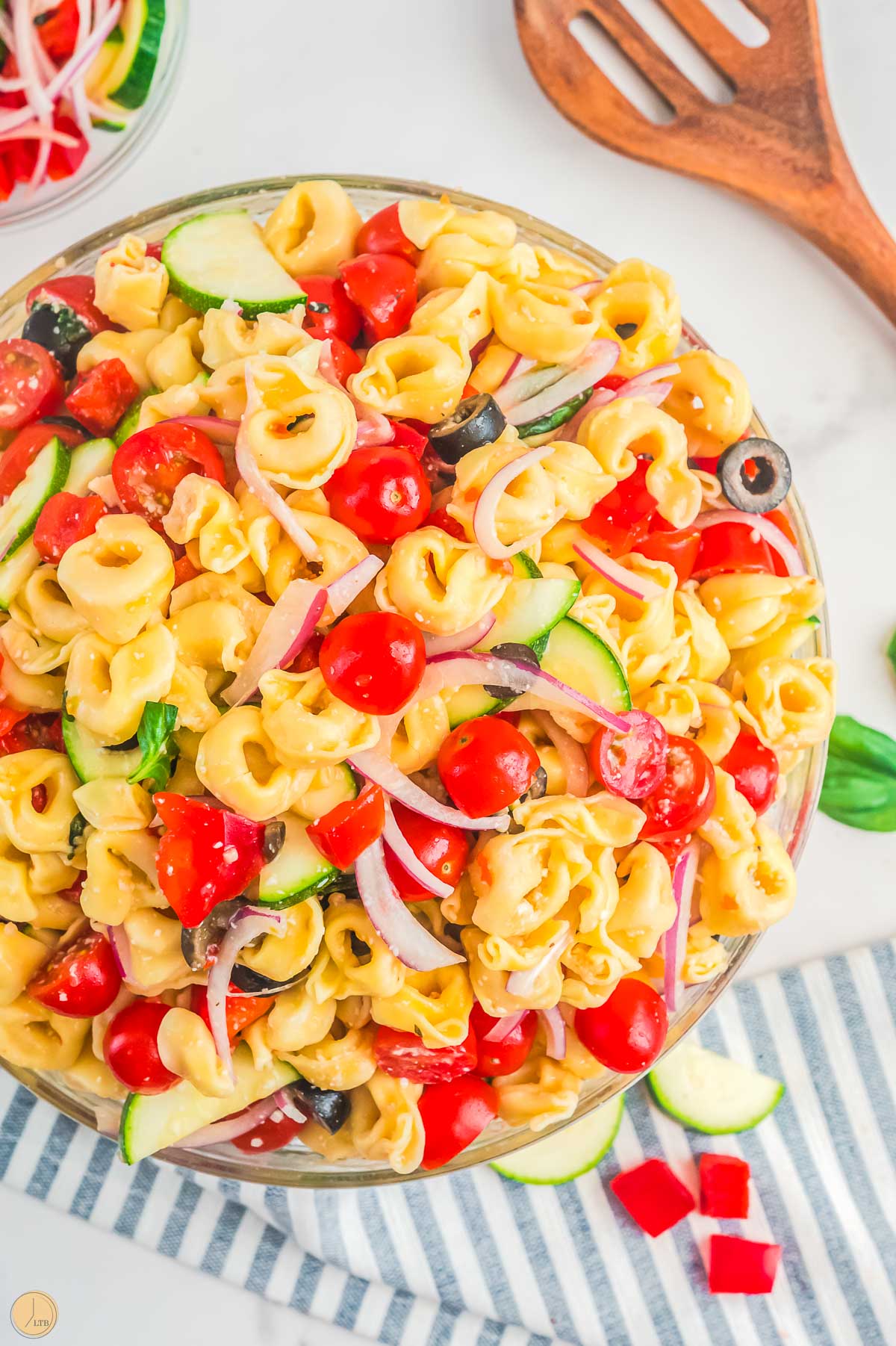 bowl of pasta salad with tortellini and italian dressing