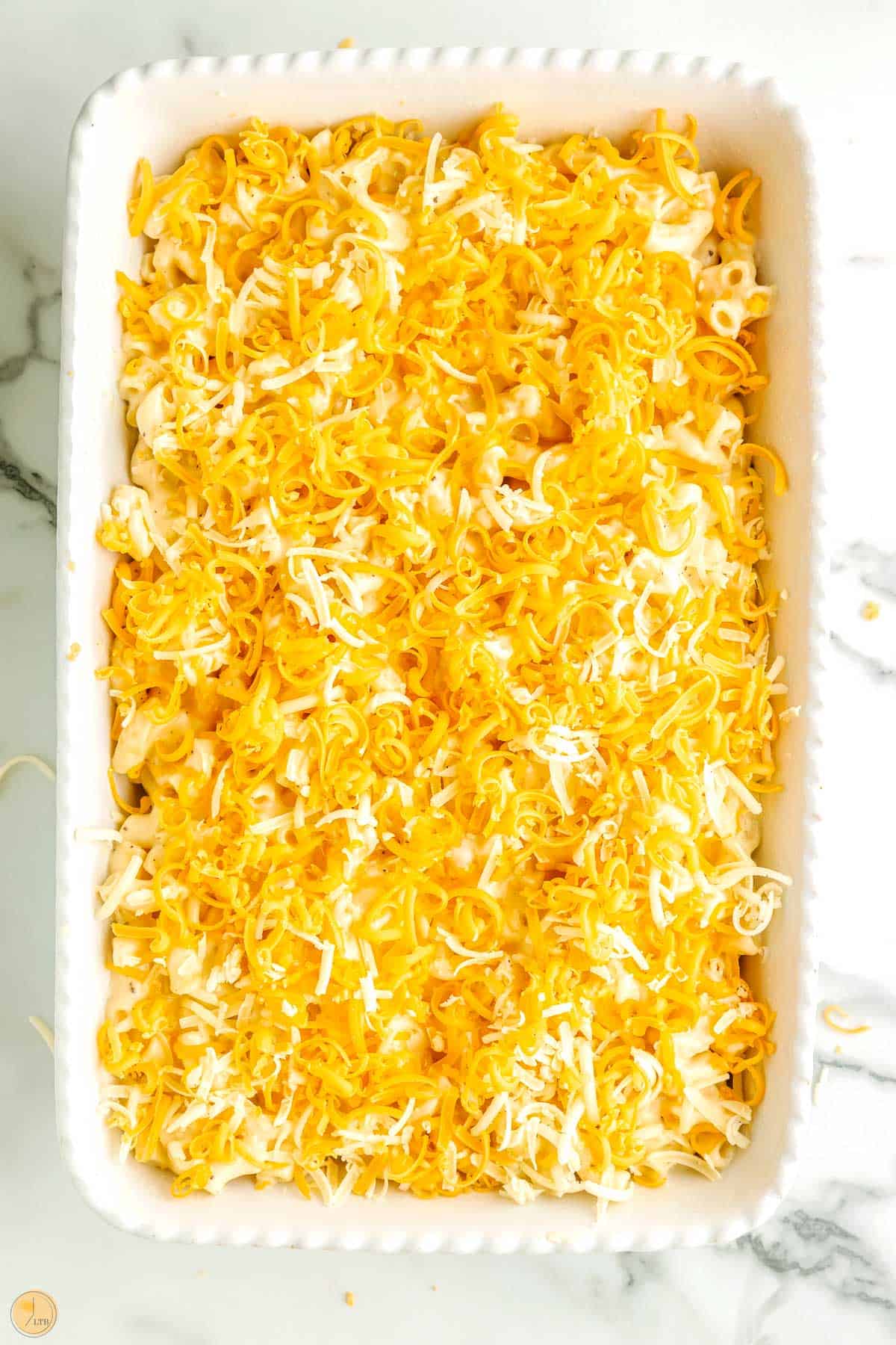 homemade taste of macaroni and cheese in a white dish