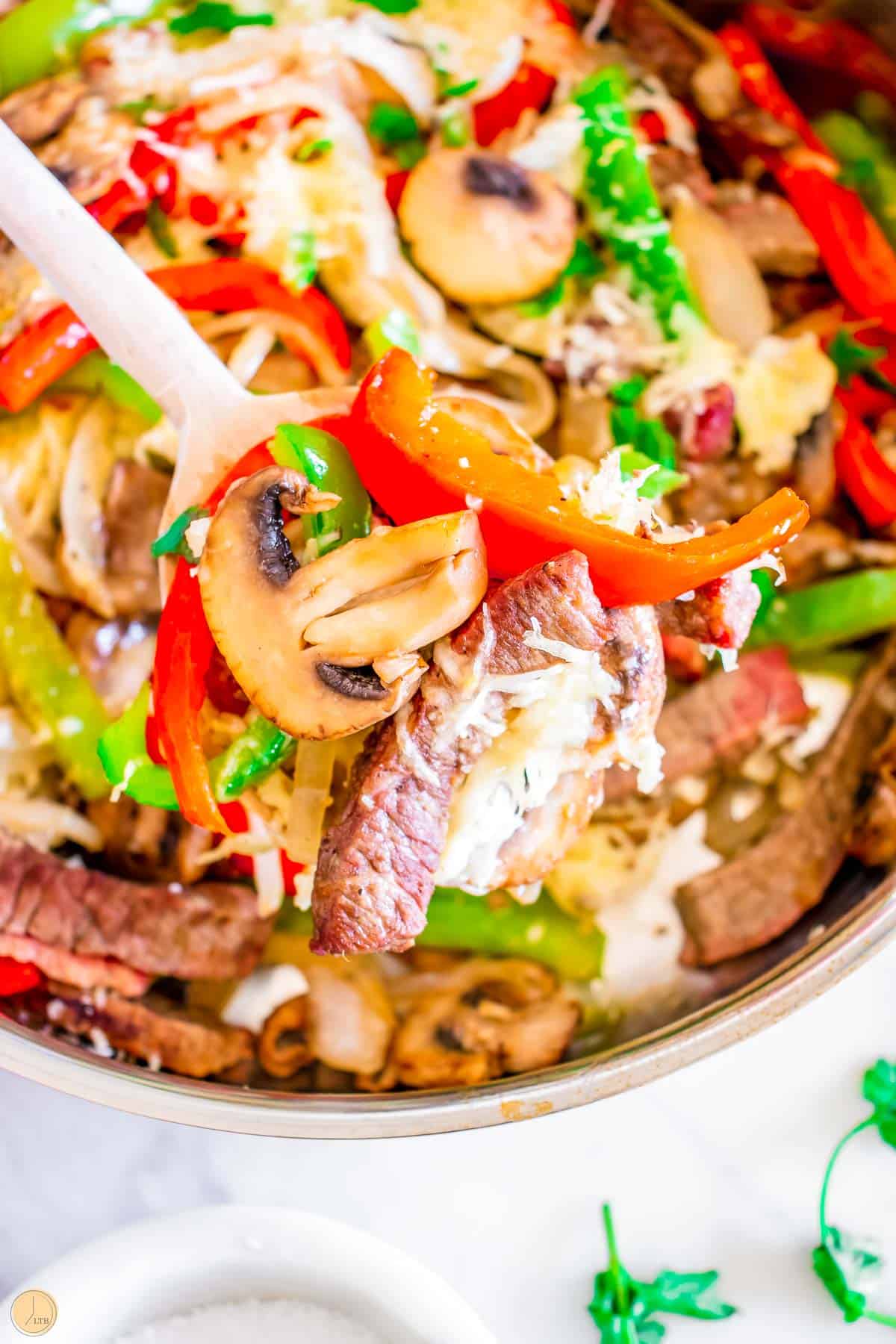 philly cheesesteak skillet dinner with peppers and onions