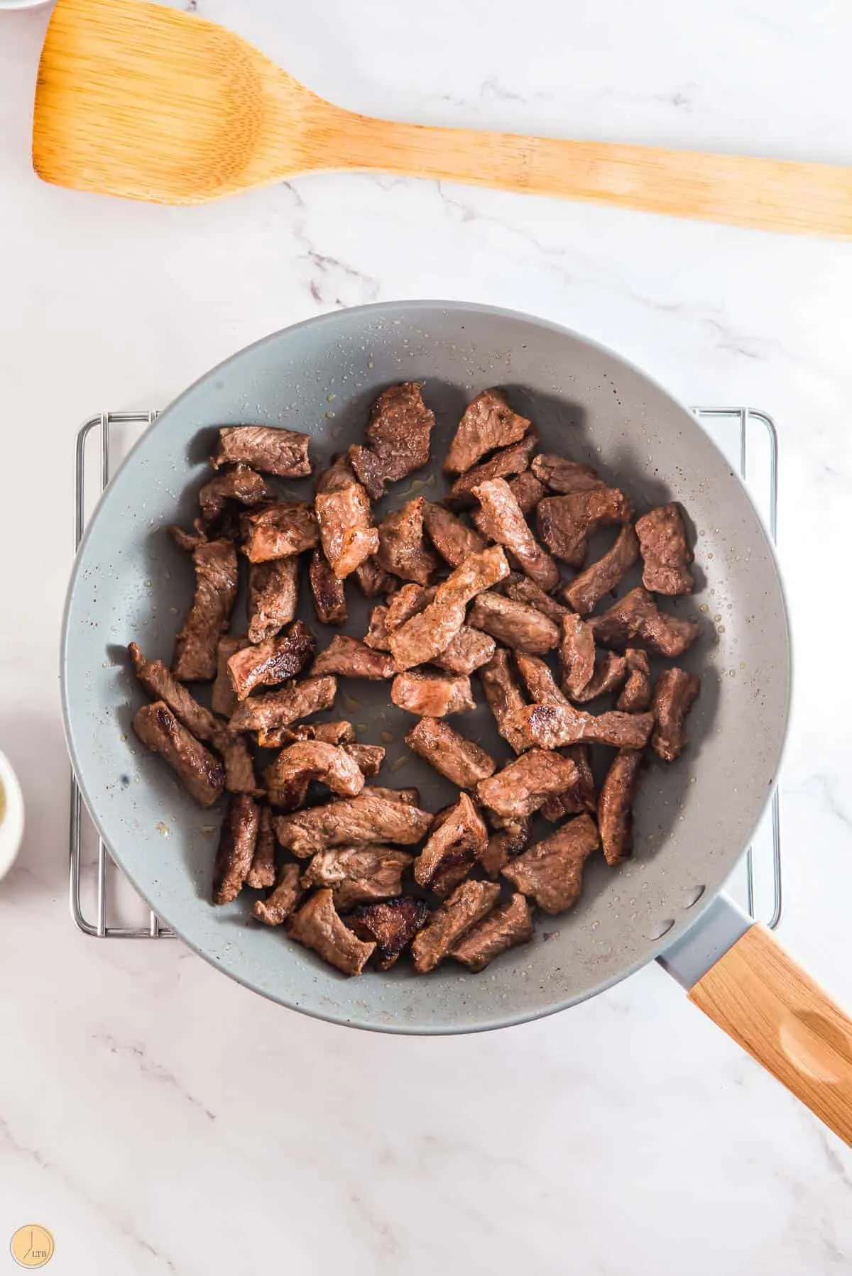 cooked beef in olive oil