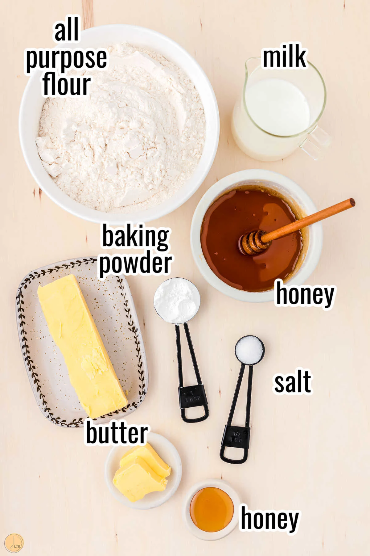ingredients for flaky honey biscuits in individual bowls