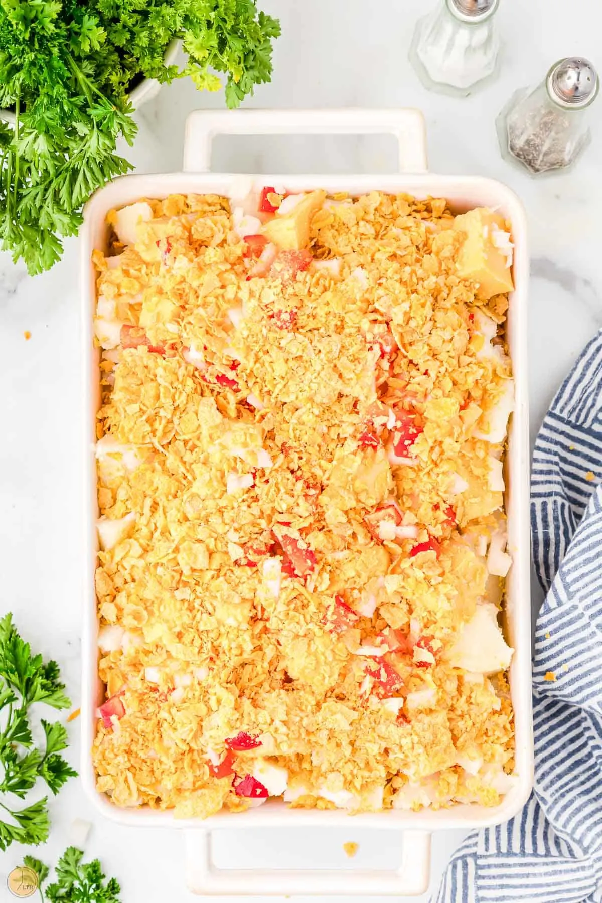 cornflakes on top of cheese and bell peppers casserole
