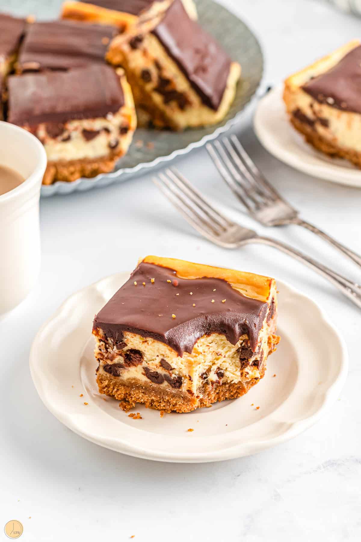 chocolate chip cheesecake bar with a bite missing