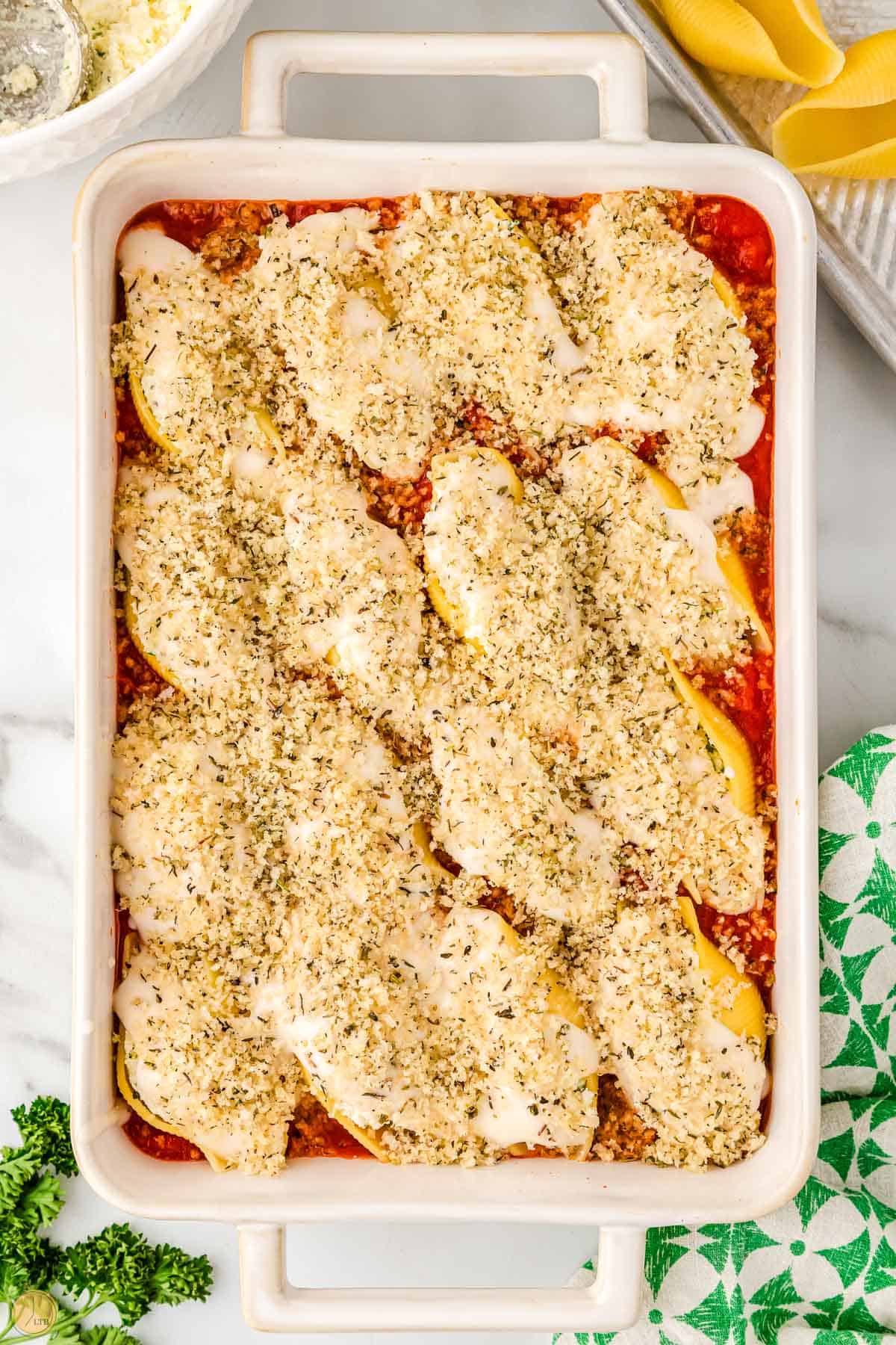 top with breadcrumbs and more sauce