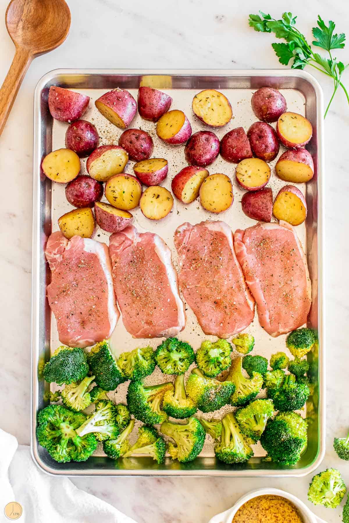 place pork chops on sheet pan after drying with a paper towel