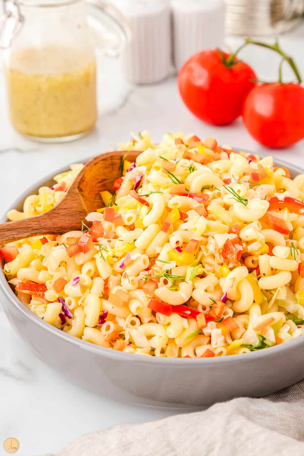this simple macaroni salad recipe is a crowd pleaser for any summer bbq