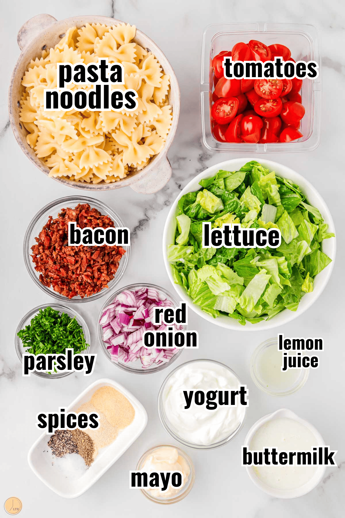 individual bowls of crispy bacon, juicy tomatoes, fresh lettuce, tender pasta, and a creamy ranch dressing.