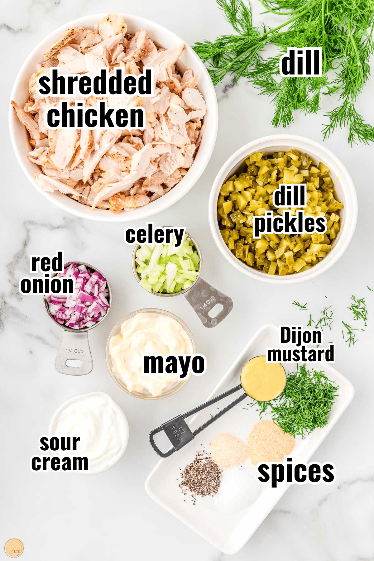 shredded boneless skinless chicken breasts and other ingredients in individual bowls