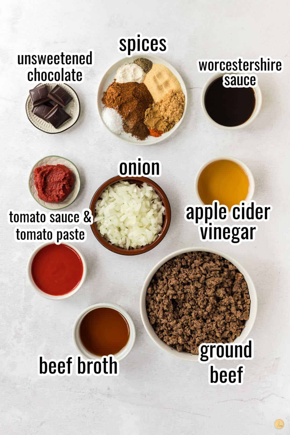 chili ingredients in individual bowls