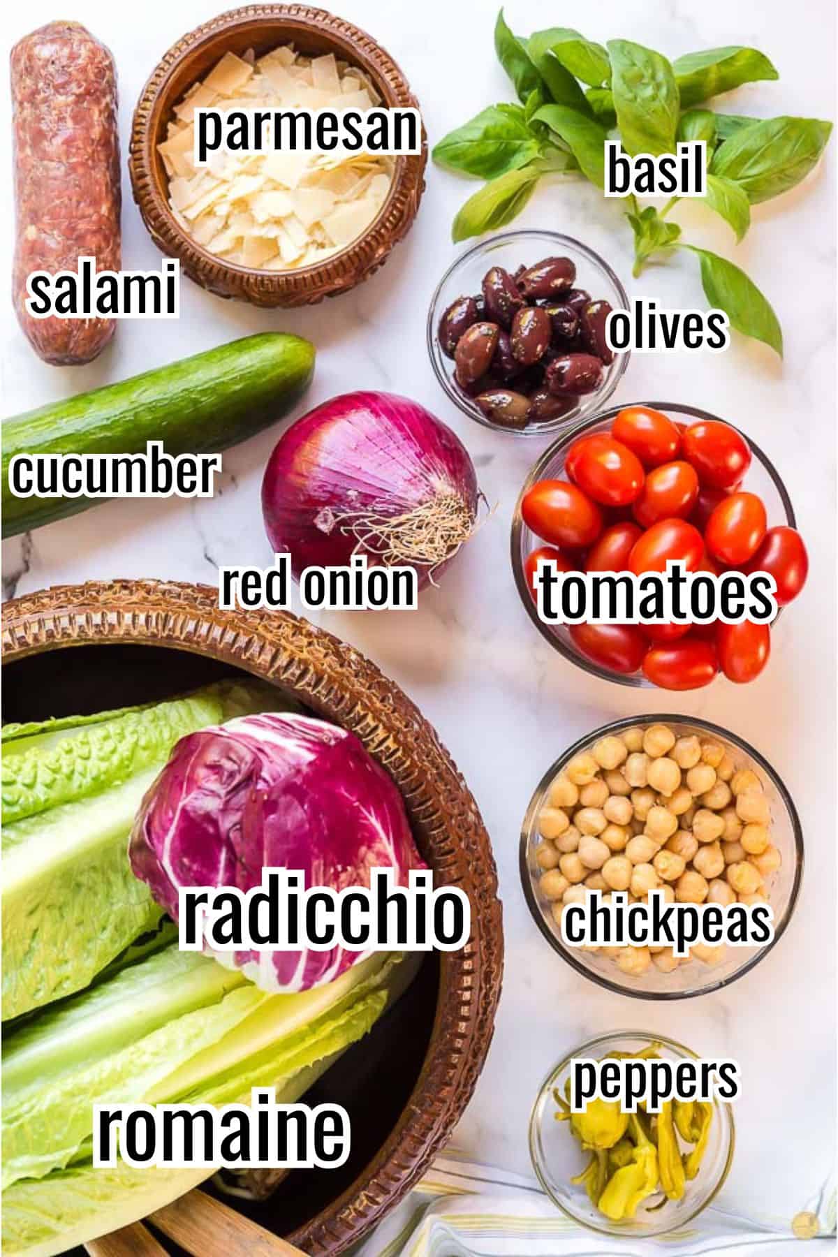 salad ingredients in individual bowls