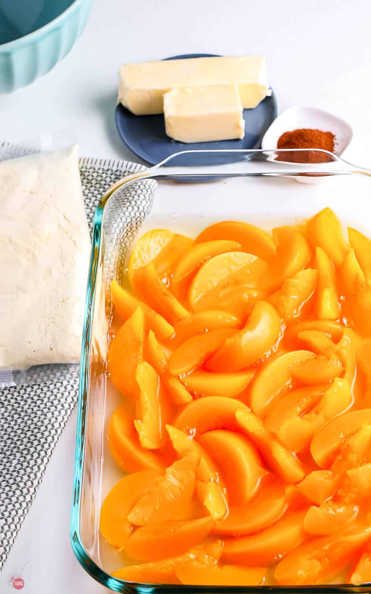 pour peaches in  casserole dish