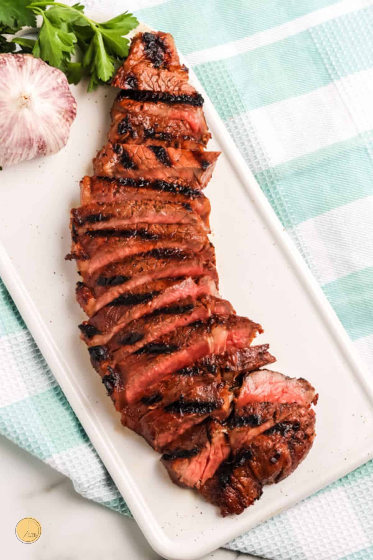 sliced steak on a platter