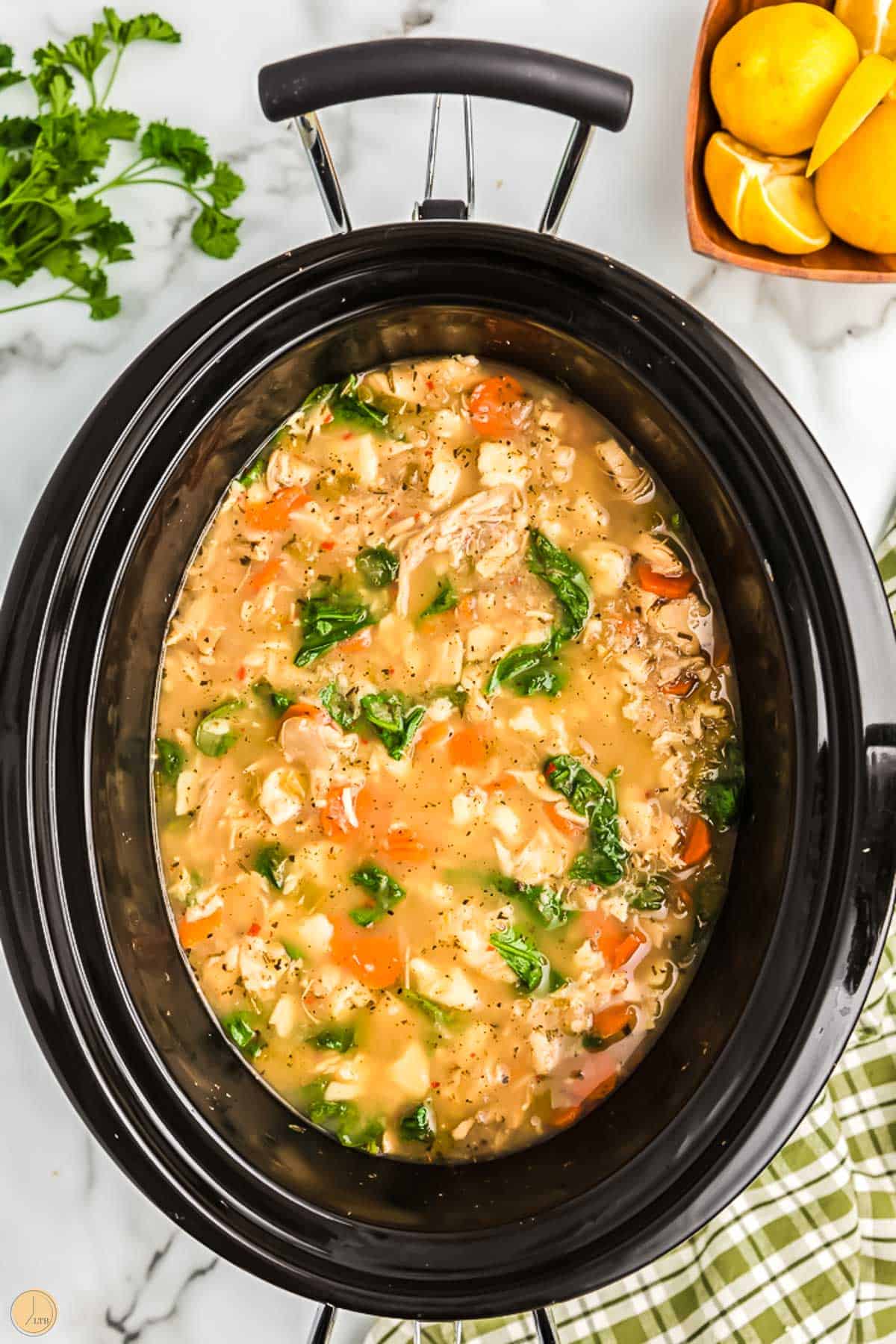slow cooker full of soup