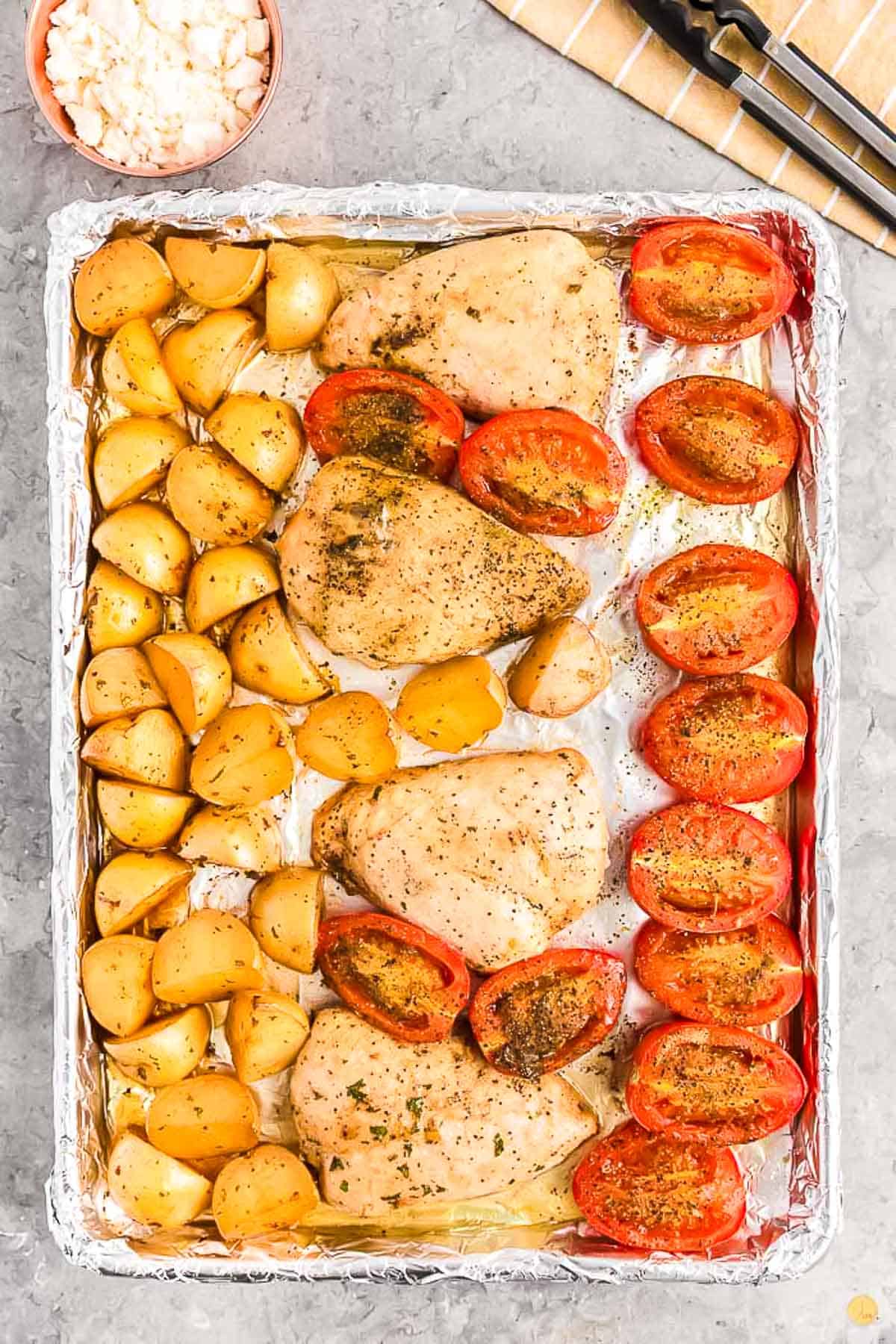 baked Greek chicken on a sheet pan