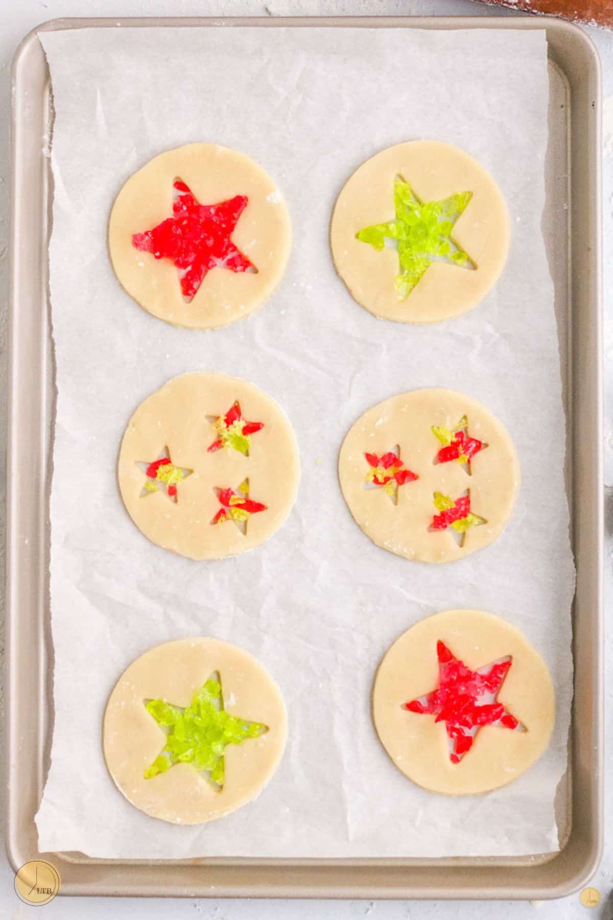 cookie stars with crushed hard candy in the holes