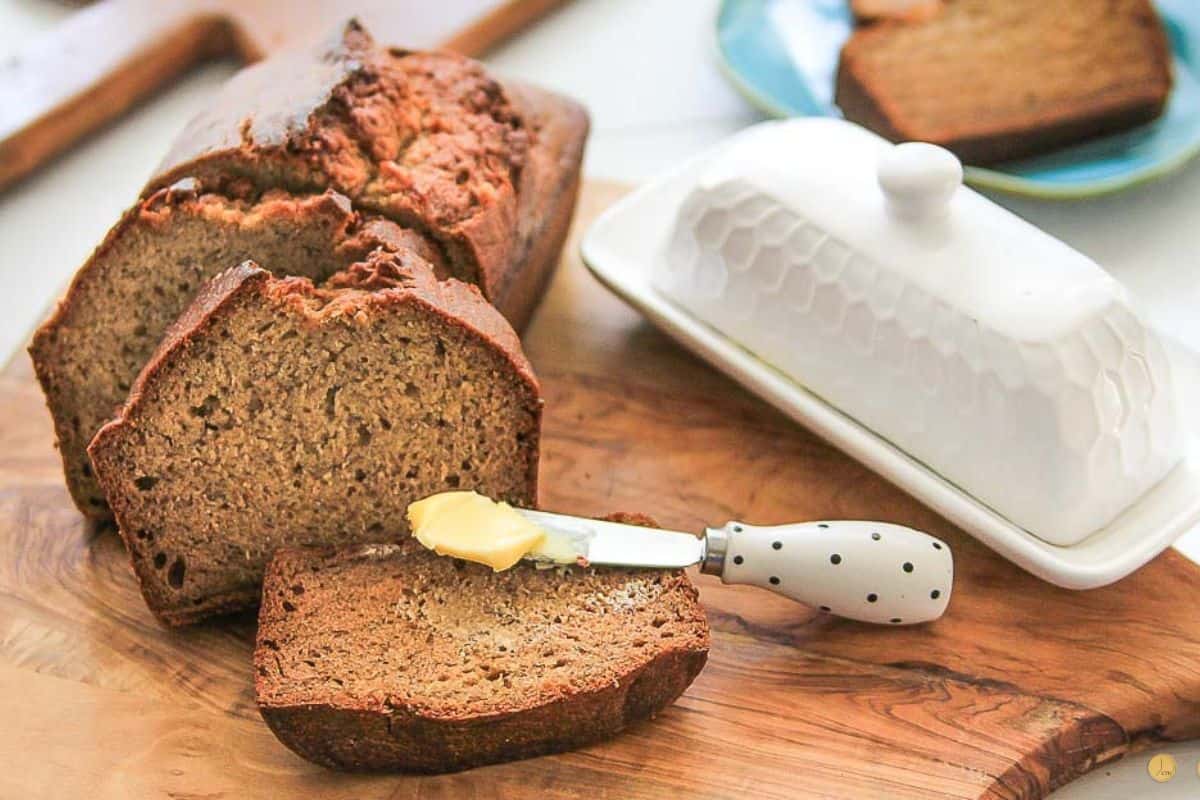 banana bread sliced on a board