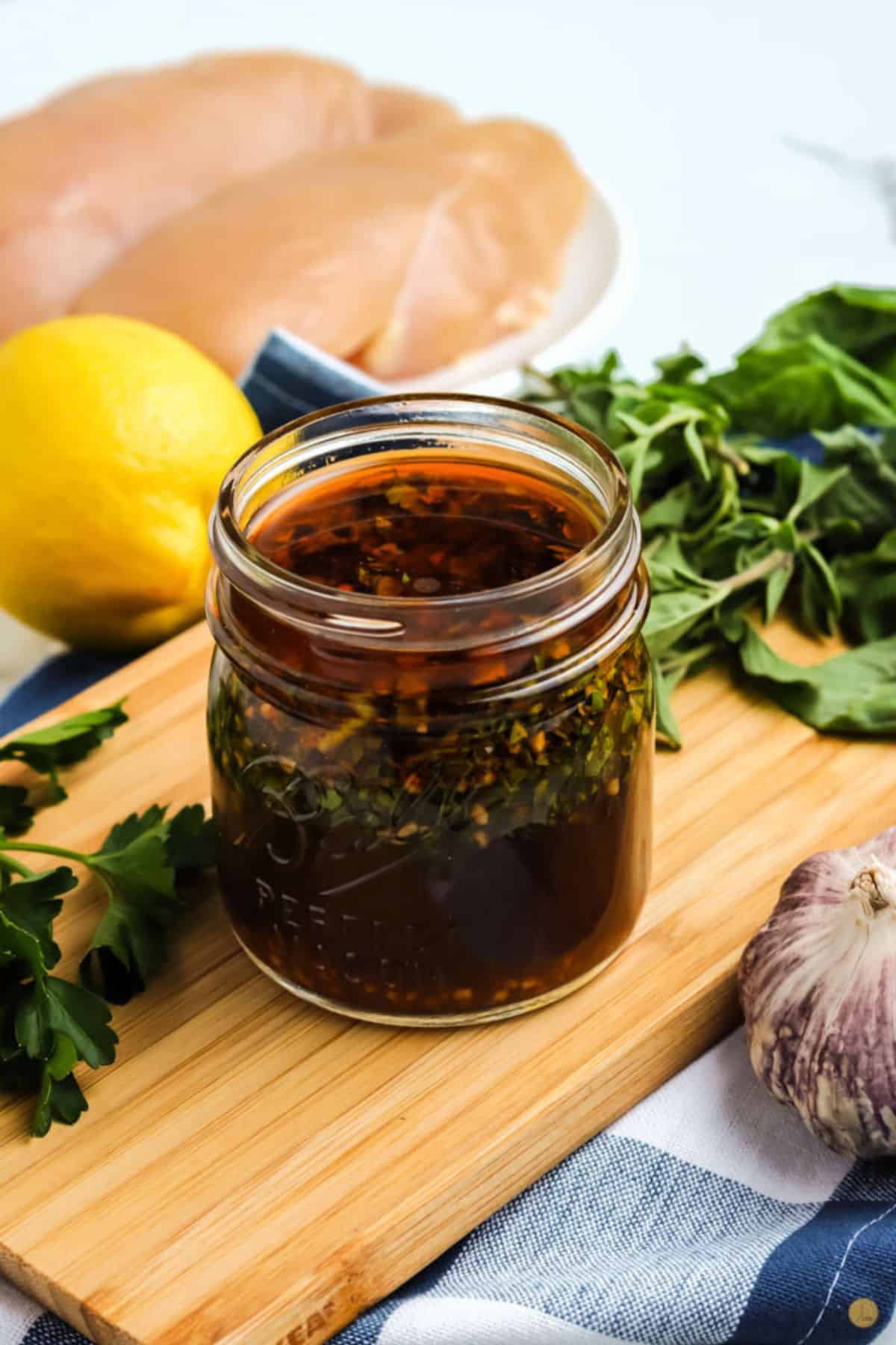 easy chicken marinade recipe in a glass jar