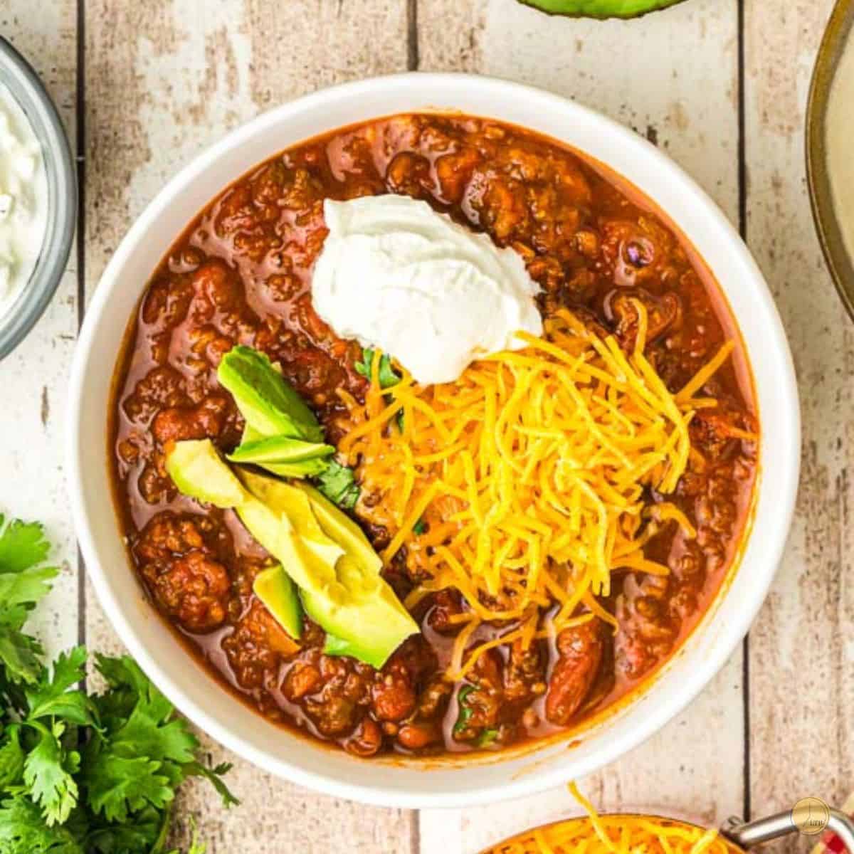 bowl of chili with avocado