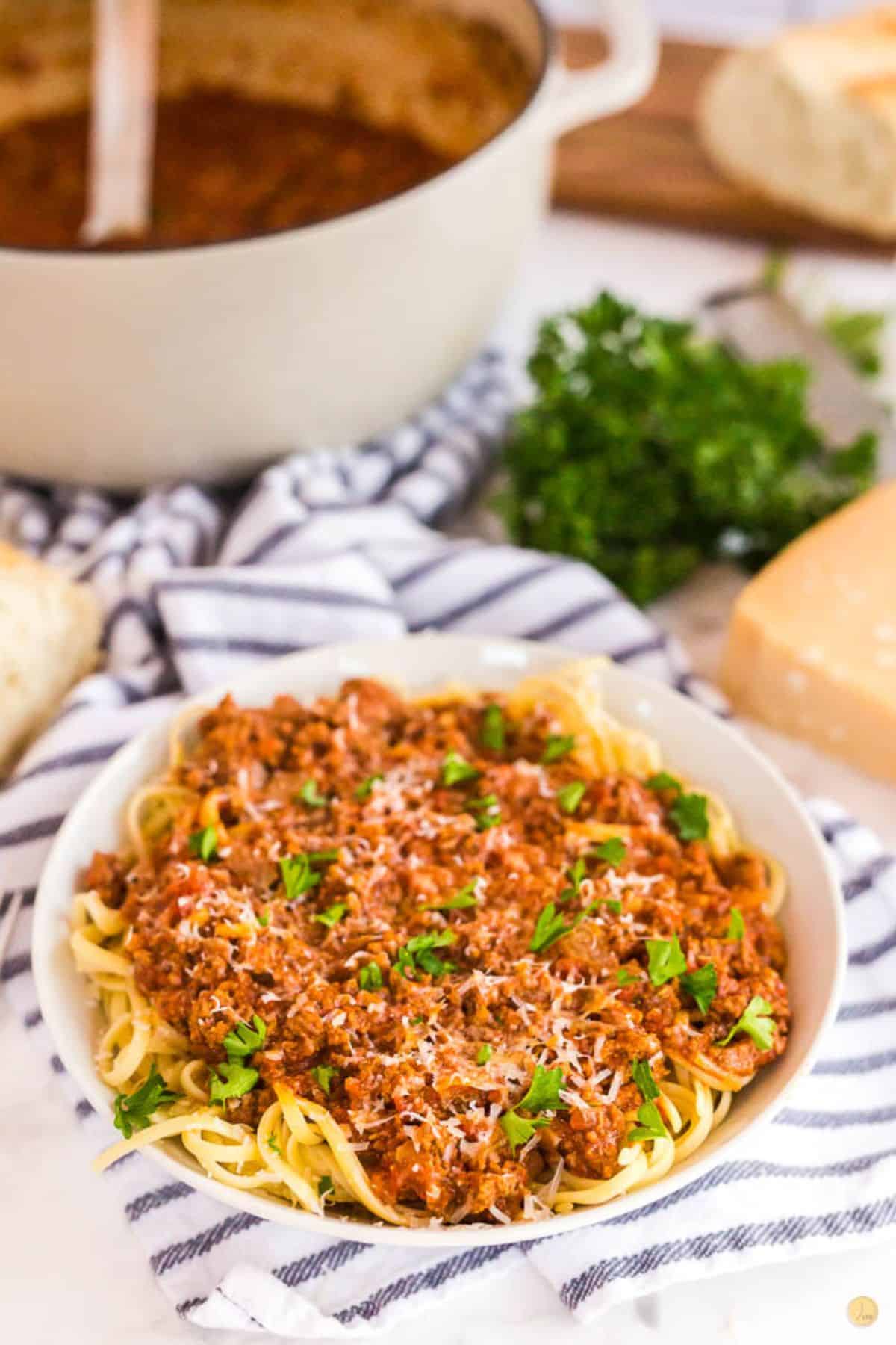 plate of meat sauce over spaghetti