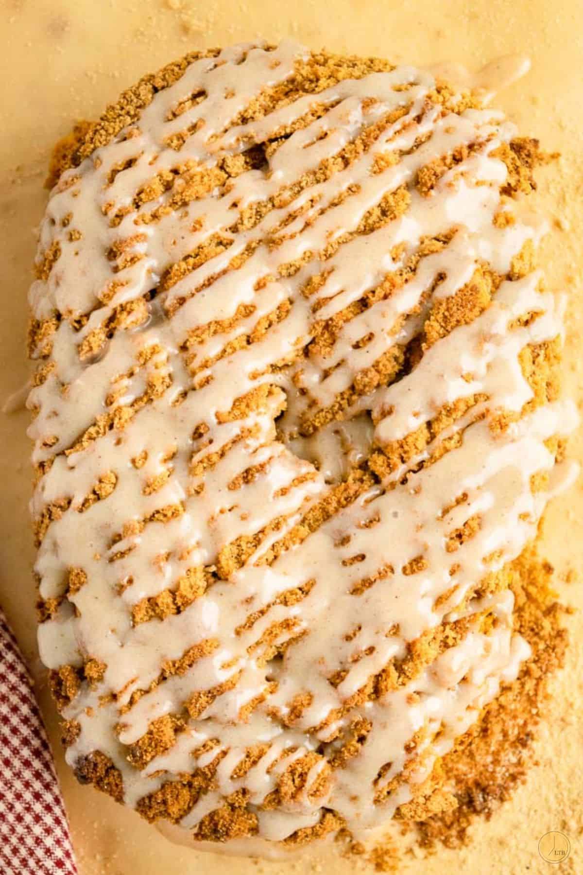 loaf of pumpkin bread with sugar glaze