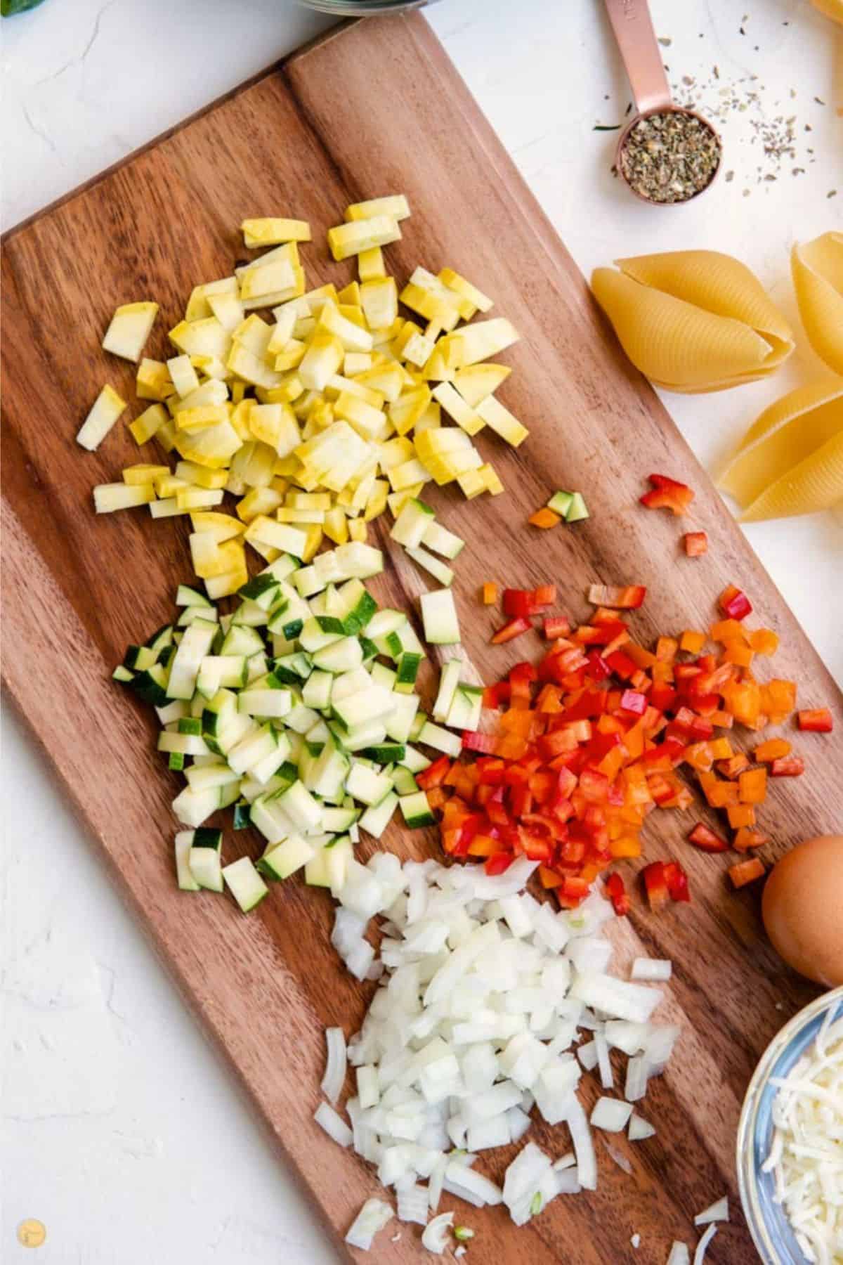 chopped vegetables on a wood board