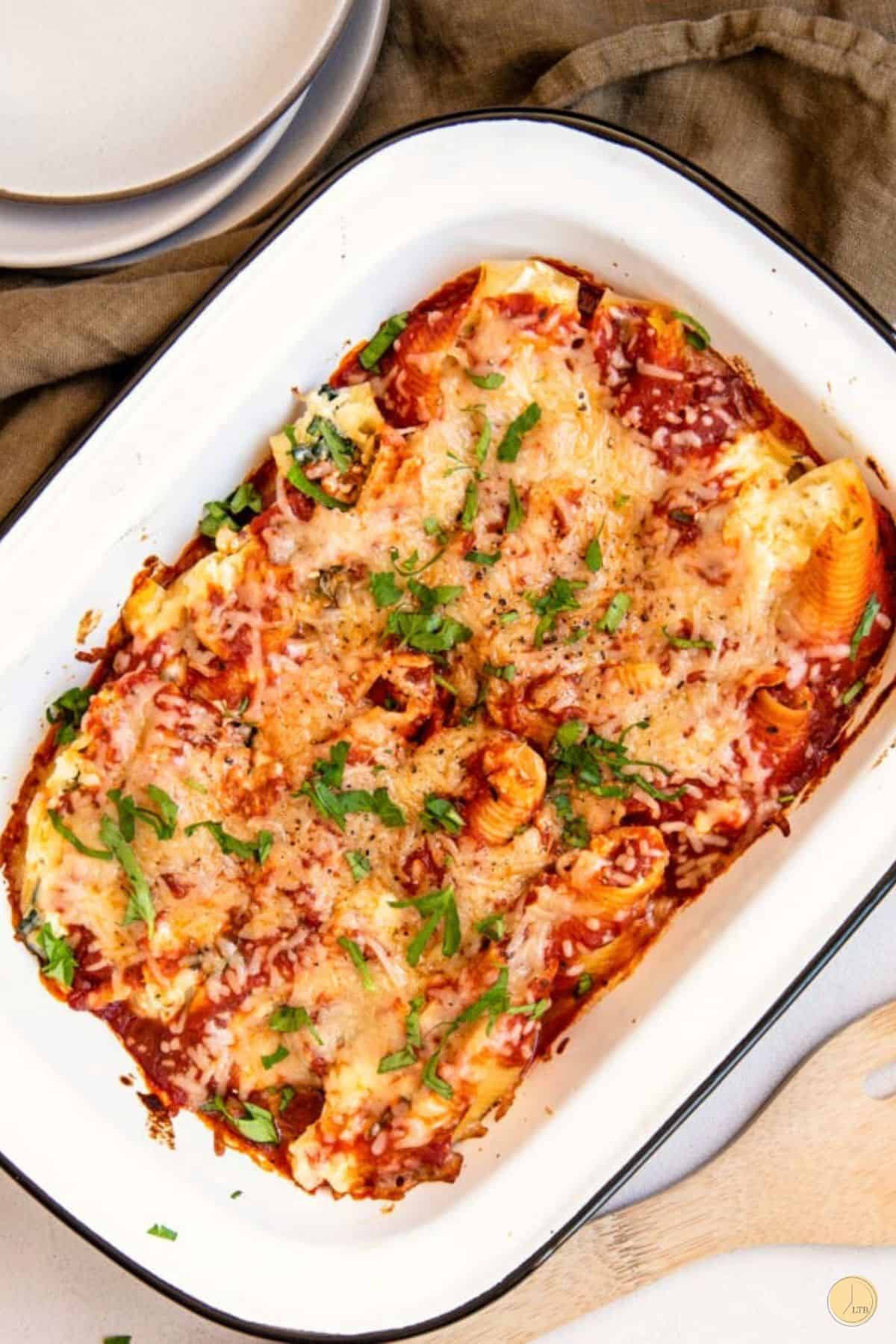 tray of stuffed shells with vegetables