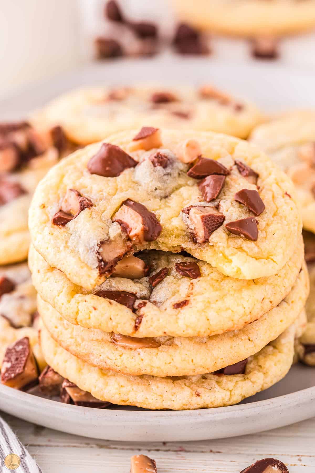 toffee and chocolate cookies in a stack