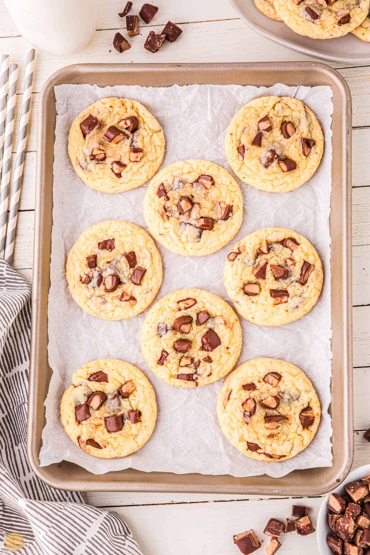 baked chocolate chip and toffee cookies on a baking sheet