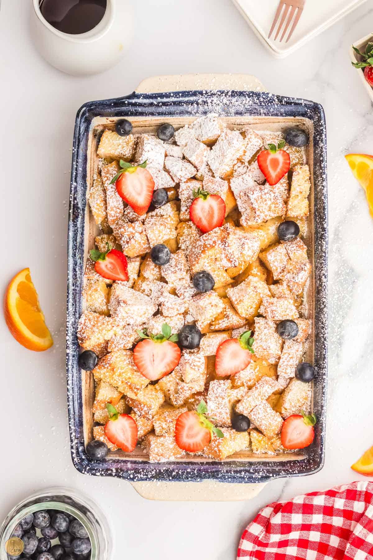 baked french toast casserole with fruit on it